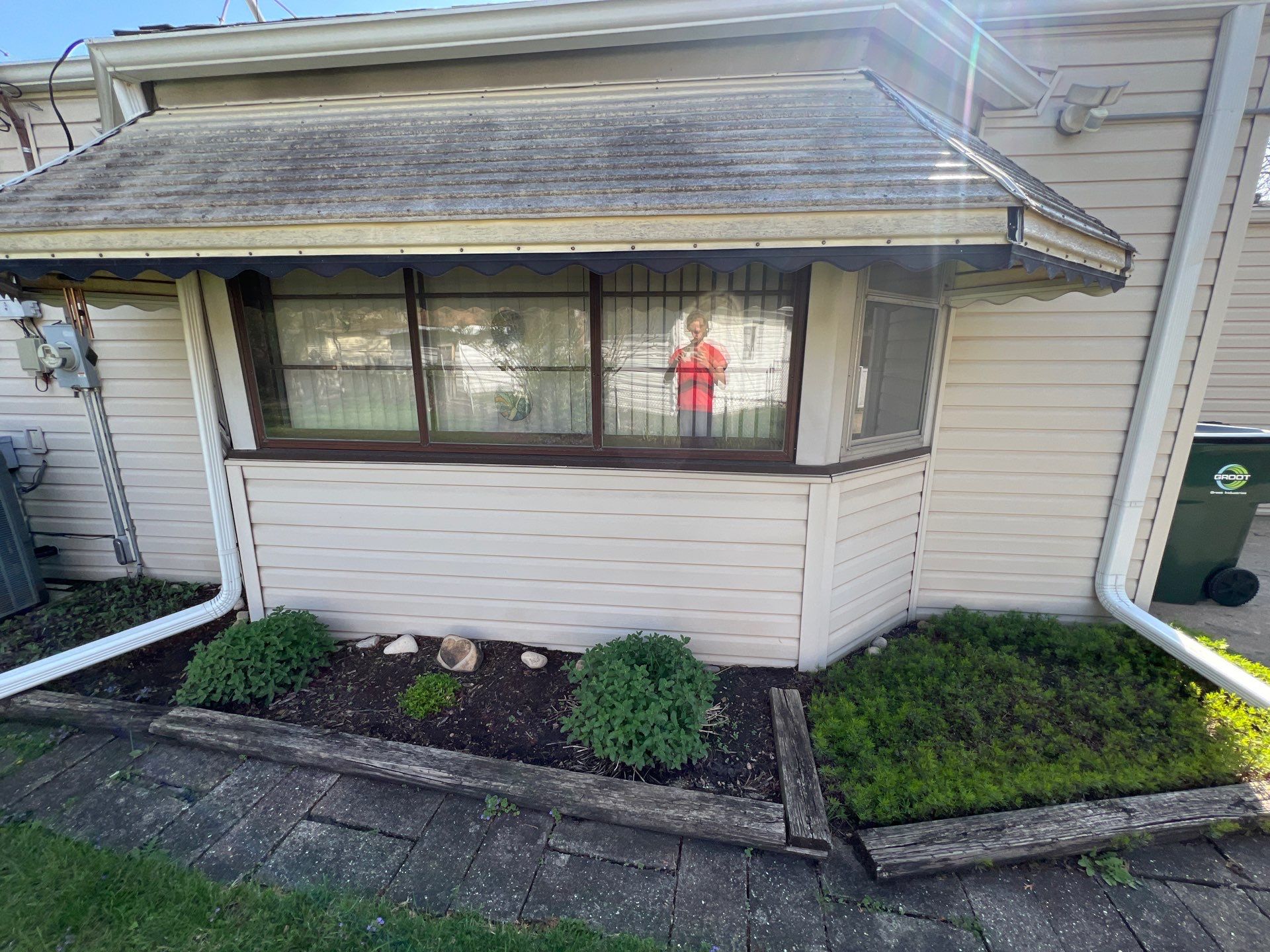 Housewashing  using Algaecide, soft wash soap by Northern Power Washing LLC.