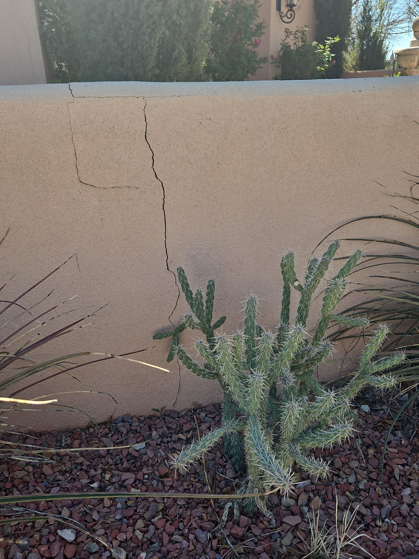 Exterior Painting with Stucco Damage by Regal Renovate