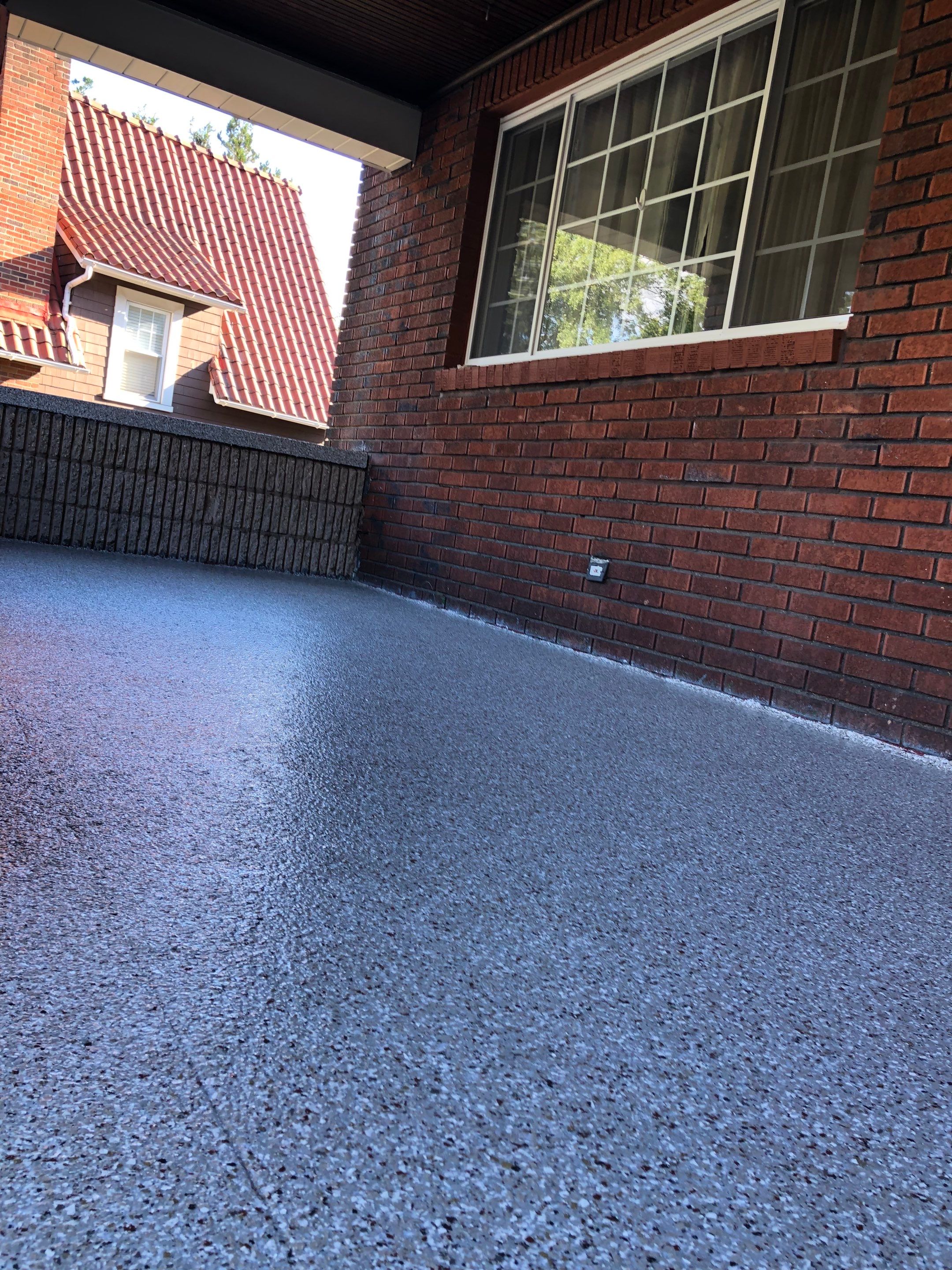 Creekbed Porch by Floors in a Day, Inc