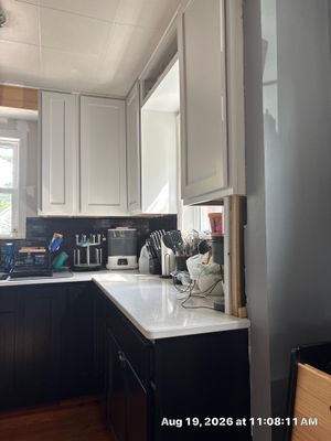 Modern Two-Tone Kitchen Remodel with Quartz Countertops in Lincoln