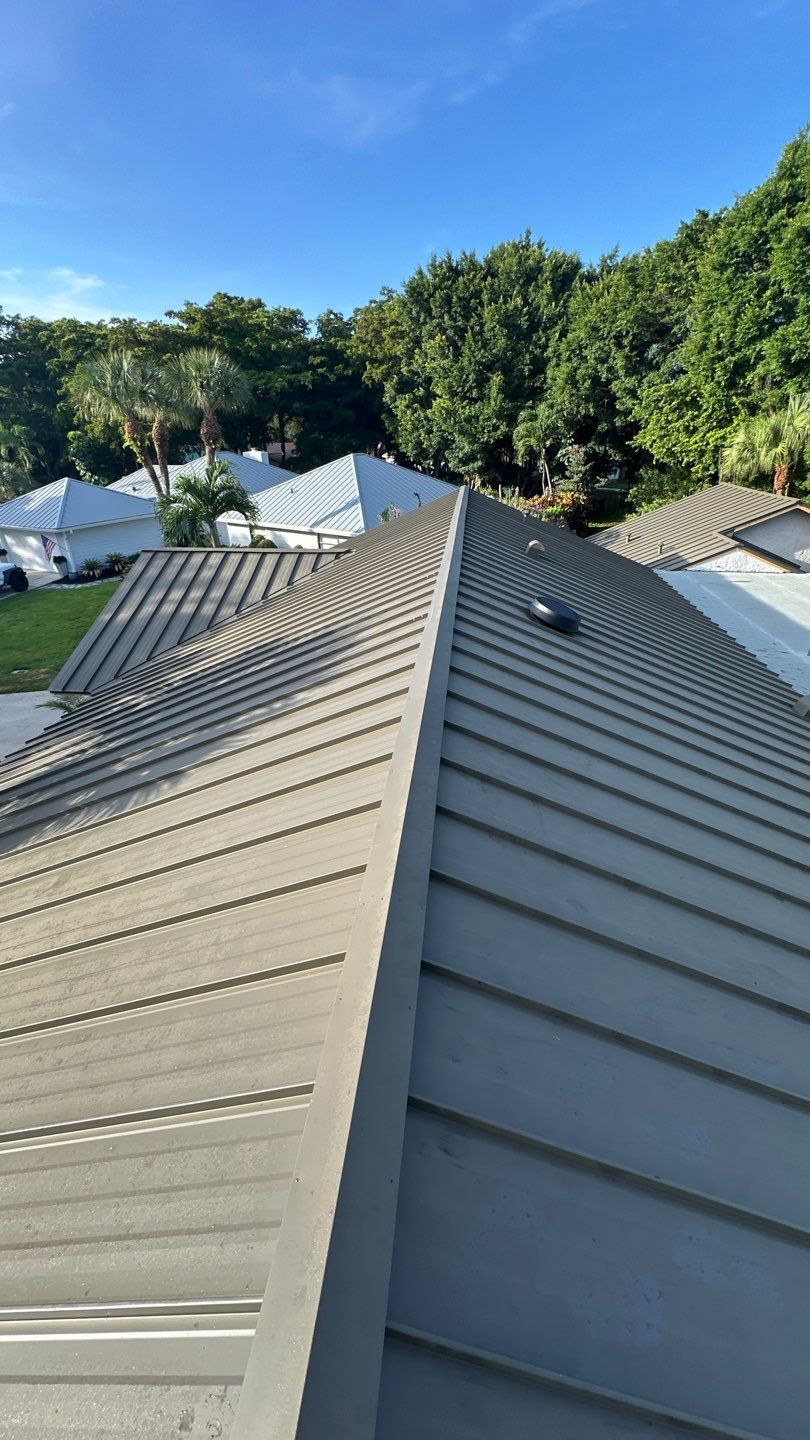 Residential Standing Seam Metal and Polyglass Flat Roof Replacement Boca Raton by AJF ROOFING INC