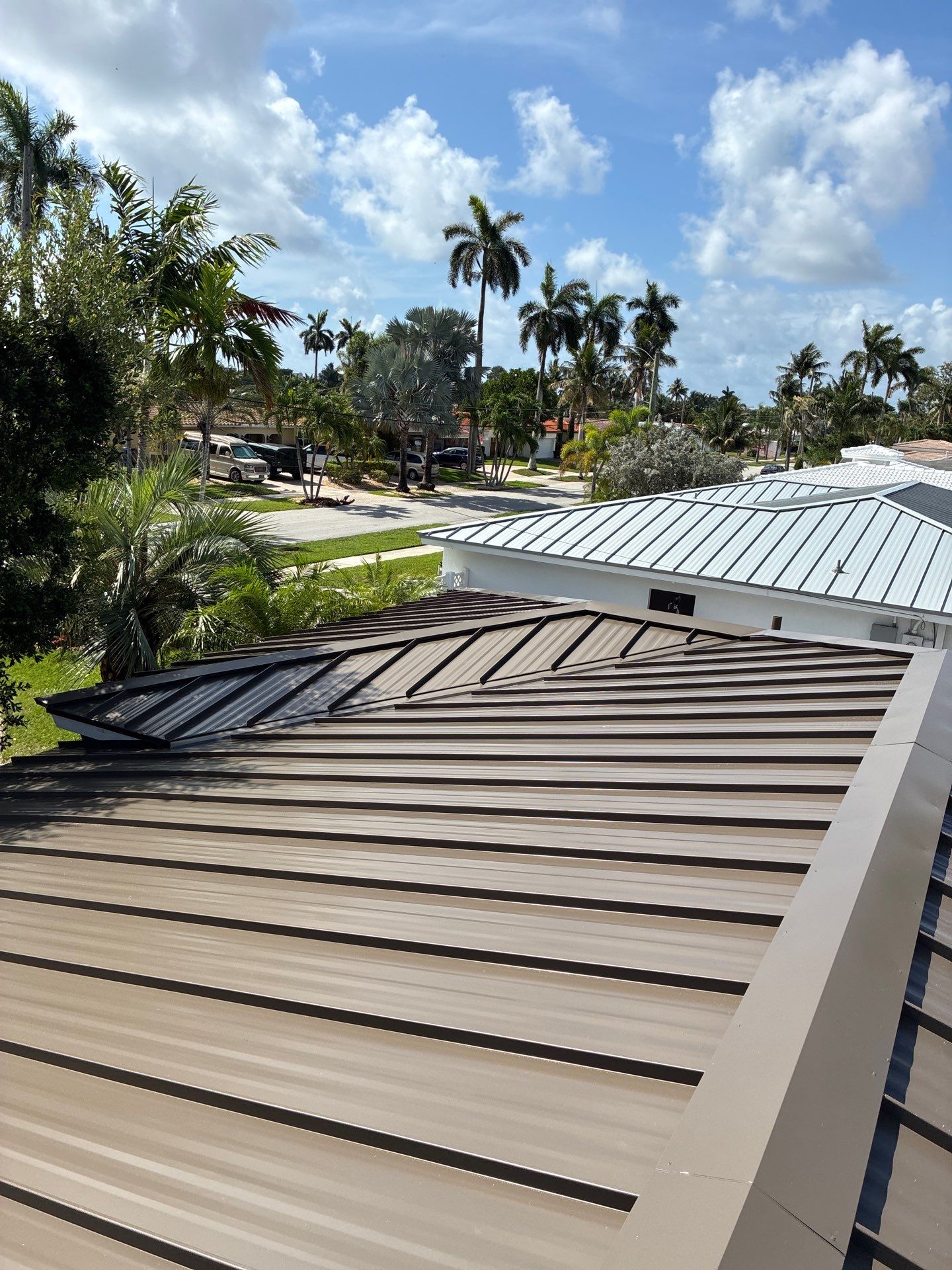 .032 Aluminum 1.5" Mechanical Seam Medium Bronze by Total Roofing System The Metal Roof Experts