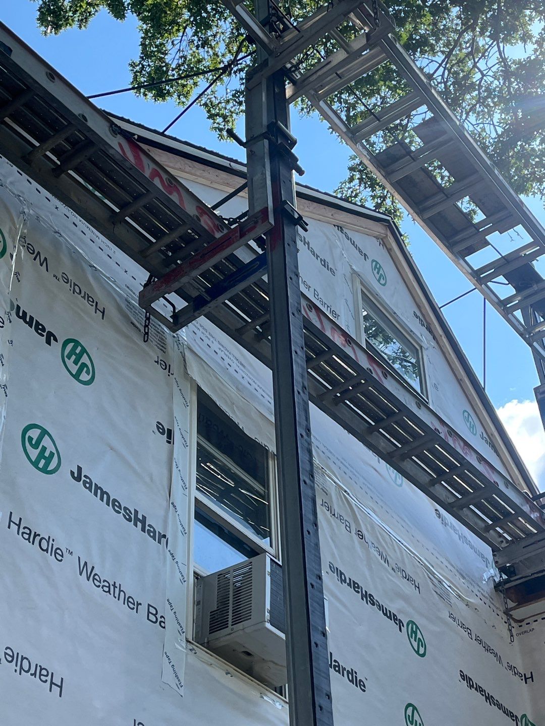 James Hardie Lap Siding Installation in Chelmsford, MA by Mighty Dog Roofing of Greater Middlesex County