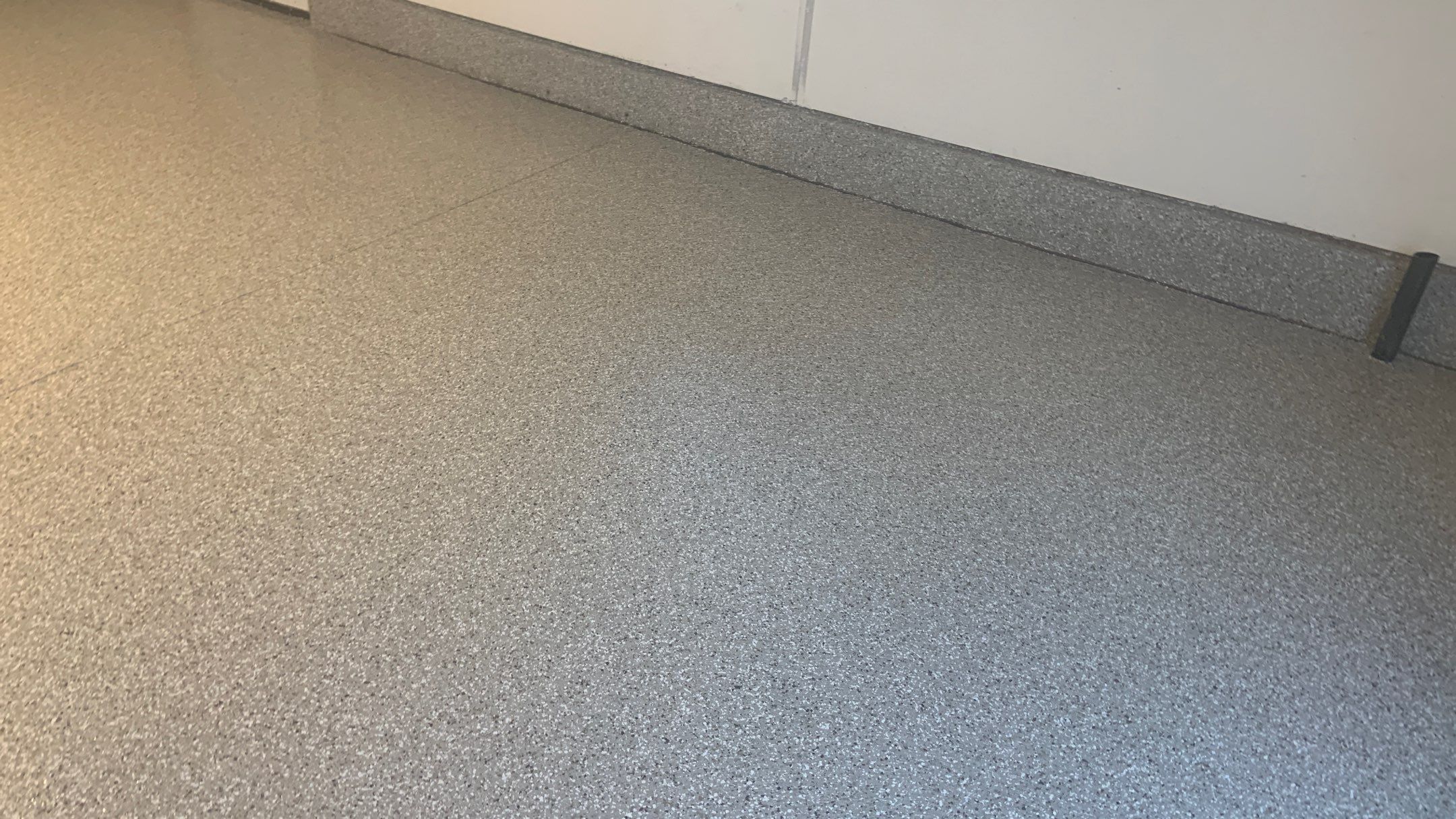 Garage Transformation using Pebble Beach by Croc Coatings, LLC