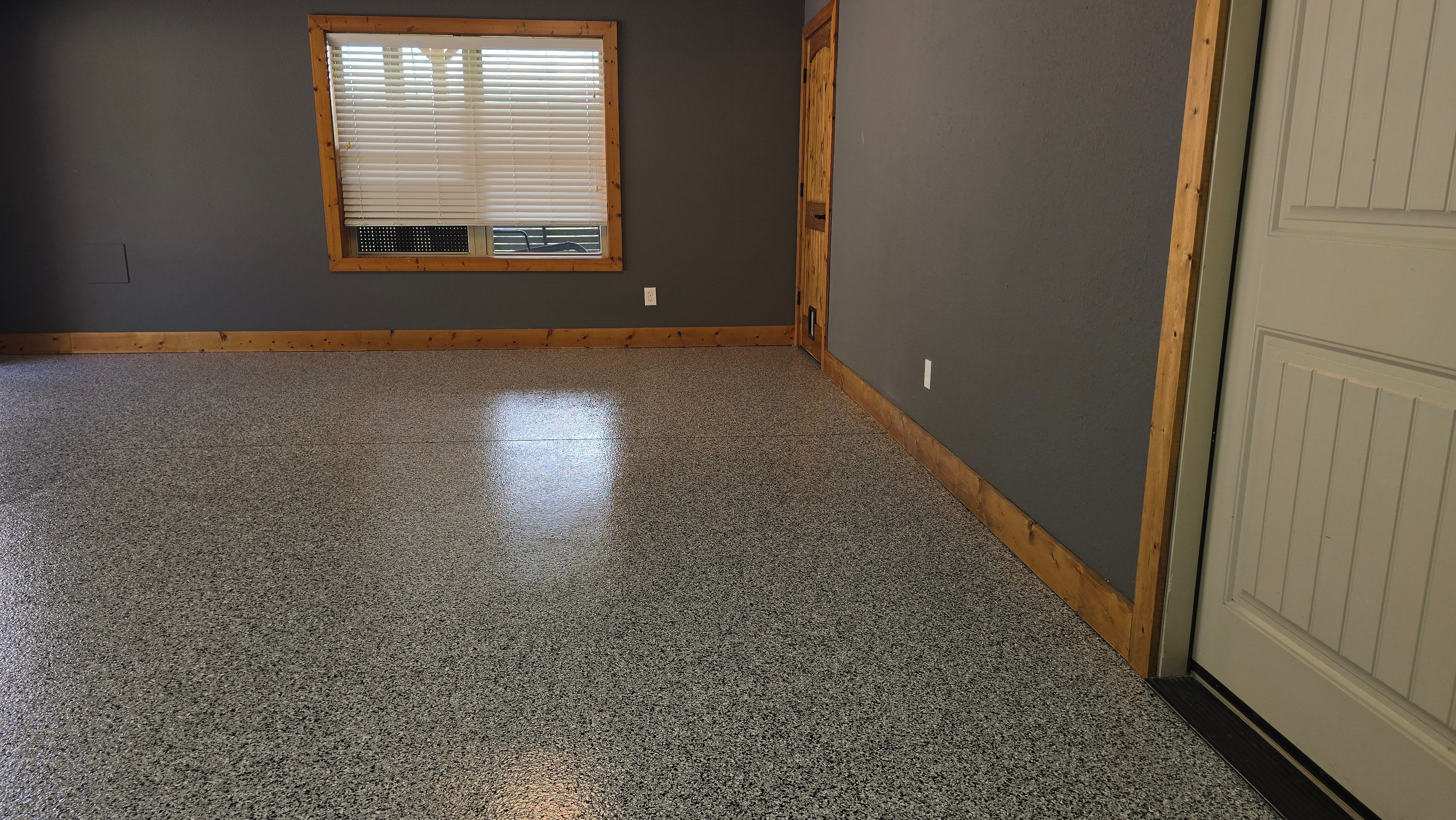 Garage using Houndstooth by Elite Floor Solutions