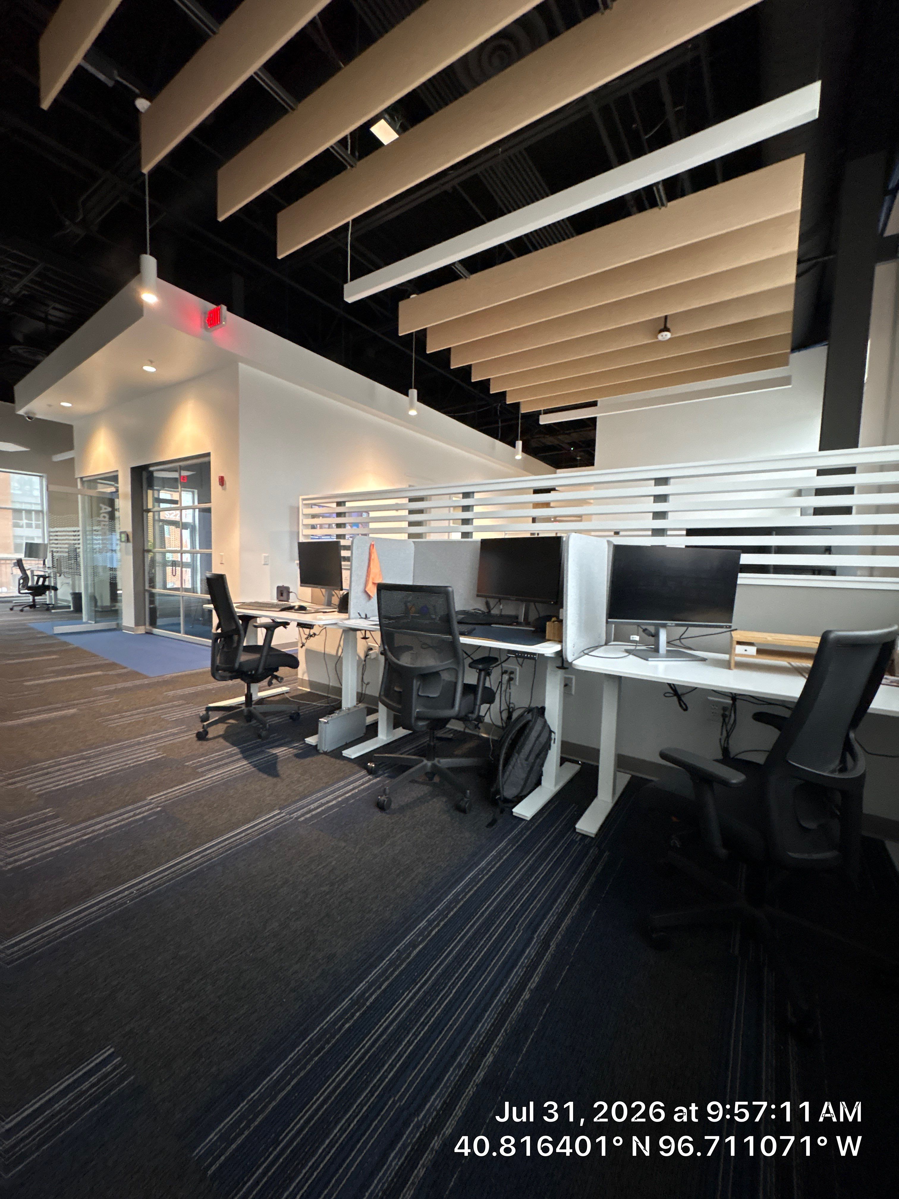 Modern Commercial Office Fit-Out with Acoustic Baffles in Lincoln by CompanyCam Sales Demo