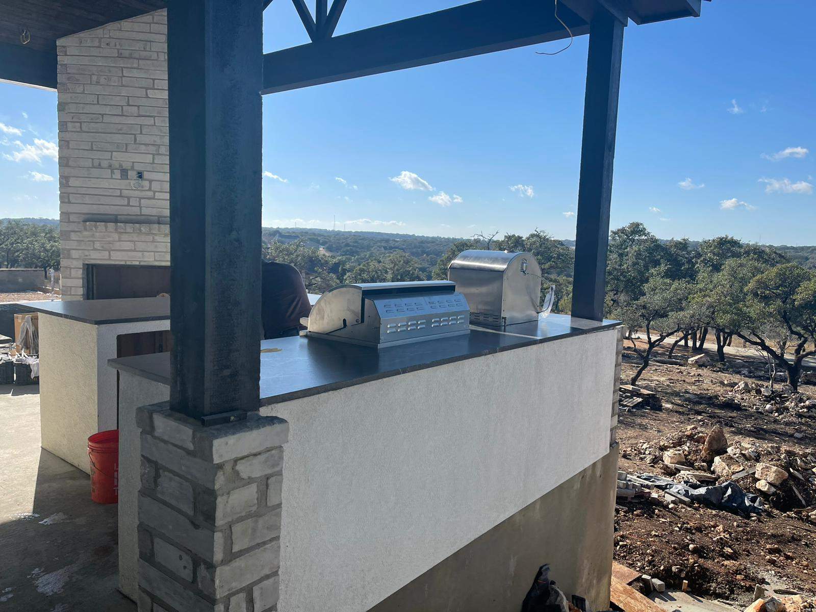 Outdoor kitchen using Black mist honed granite by Mena stone surfaces