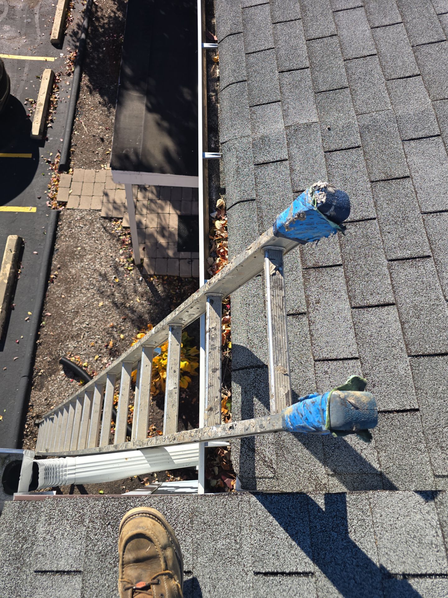 Commercial gutter cleaning Cleveland before photo with filled gutters