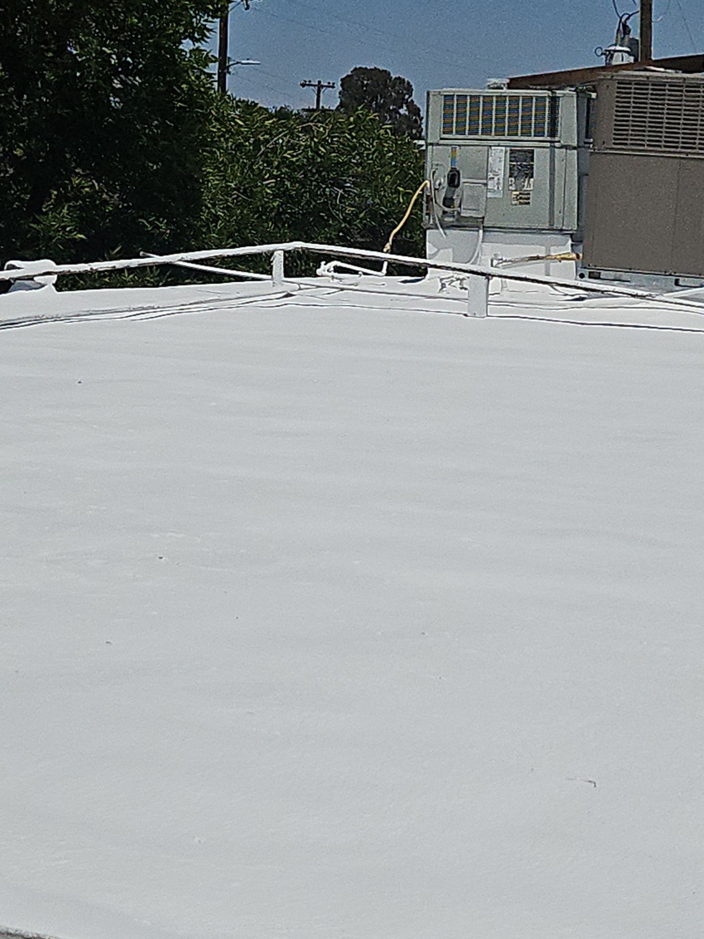 Foam Refurbish using General Coatings acrylic coatings and spray foam by Straight Edge Roofing Inc