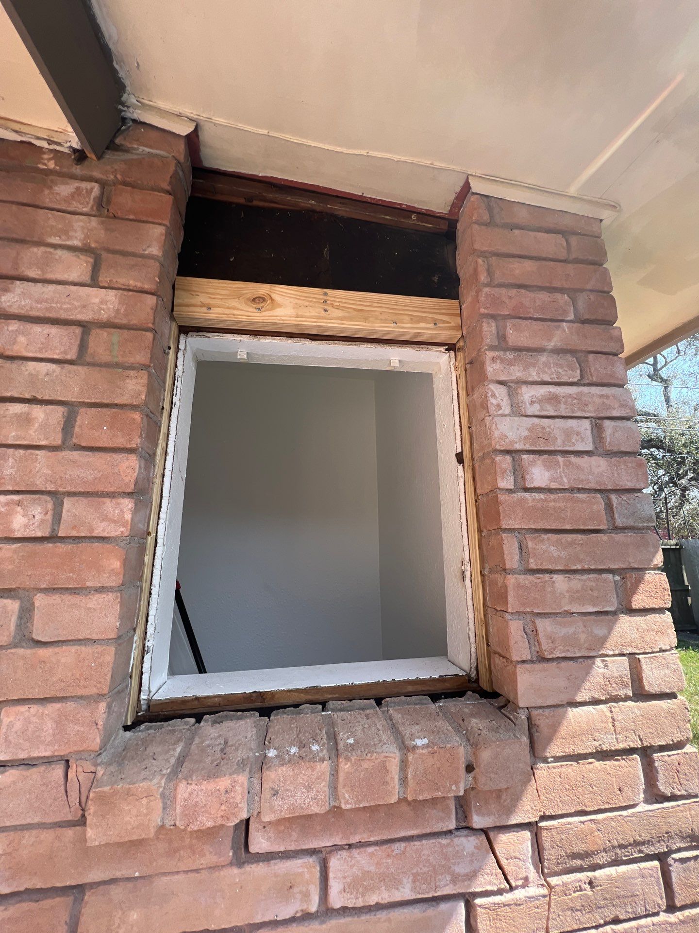 Windows in Brick with a Bay Window by Bayfront Roofing and Construction