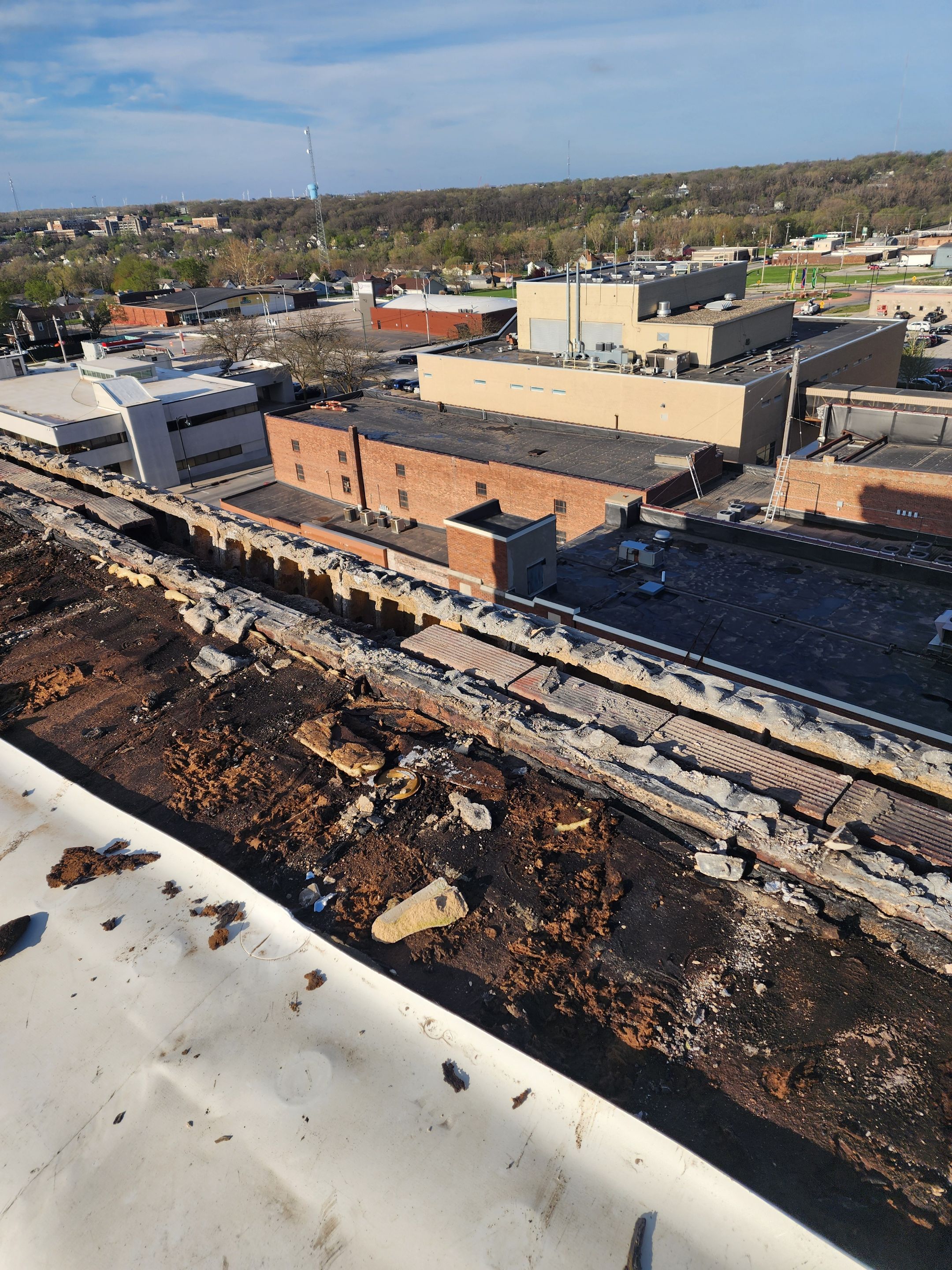 Emergency Roof Repair - Turned Roof Replacement by Grell Roofing, LLC