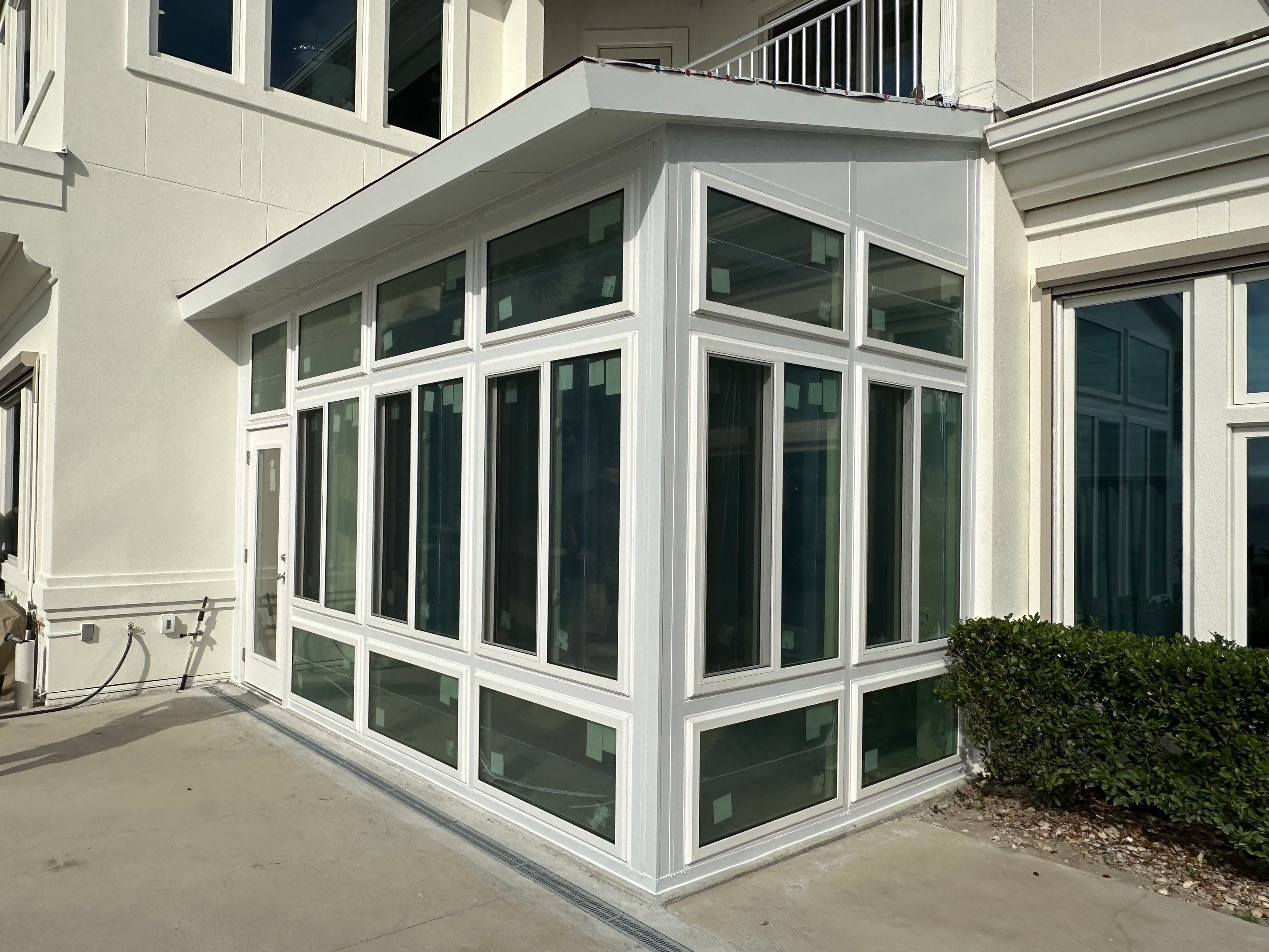 Miramar Beach Glass Room w/Hurricane Resistant Colorbeam by Titan Sunrooms
