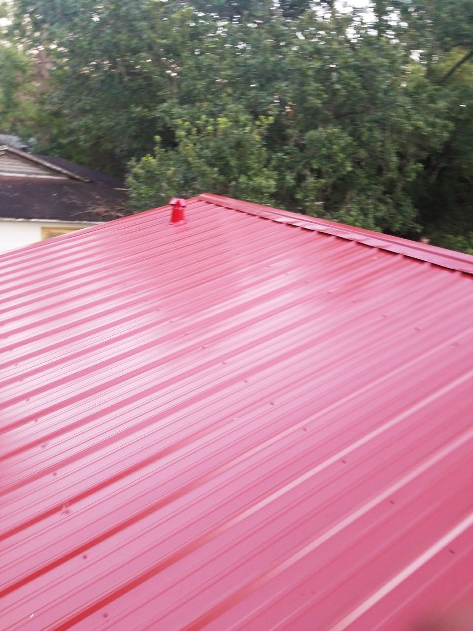 Residential Roofing Installation using Metal roofing by American Roofing & Construction LLC
