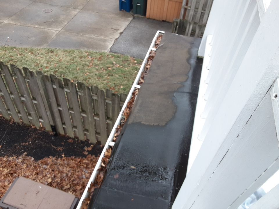 Residential Roof Replacement using Patio Roof by Absolute Roofing and Construction