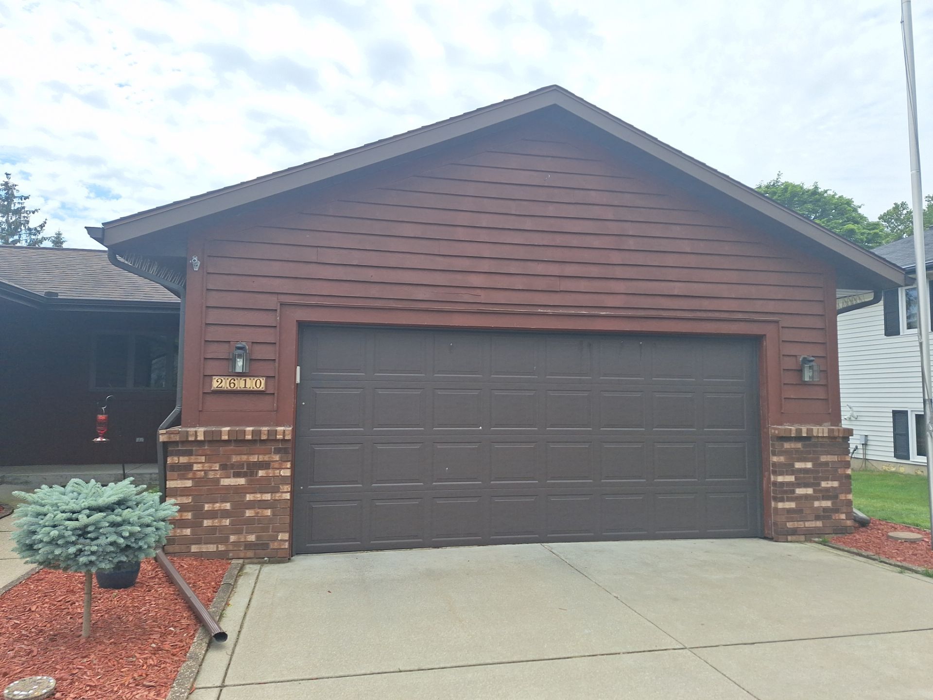 Front of home and garage staining by Gordon Painting