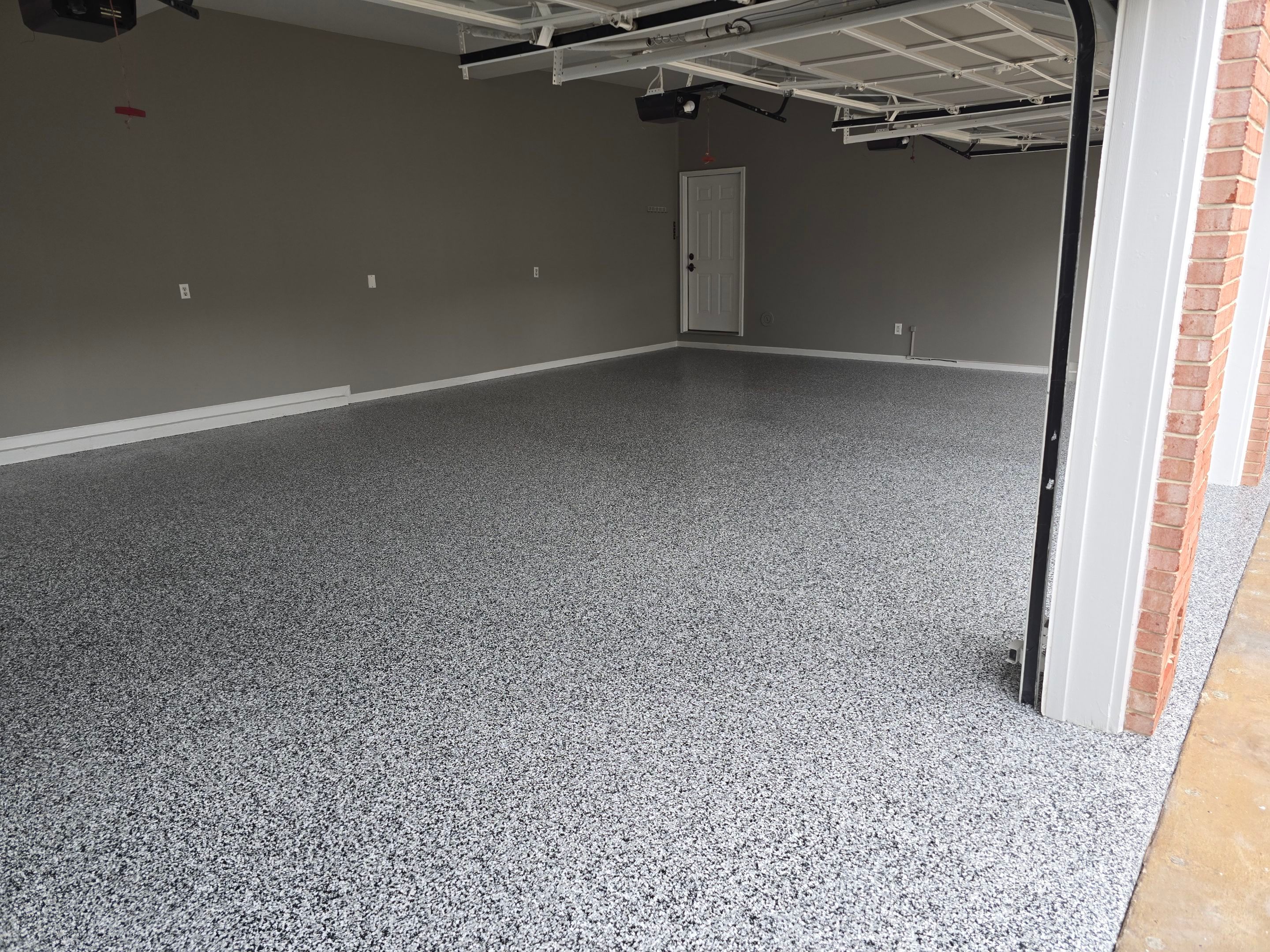 Garage using Domino by Elite Floor Solutions