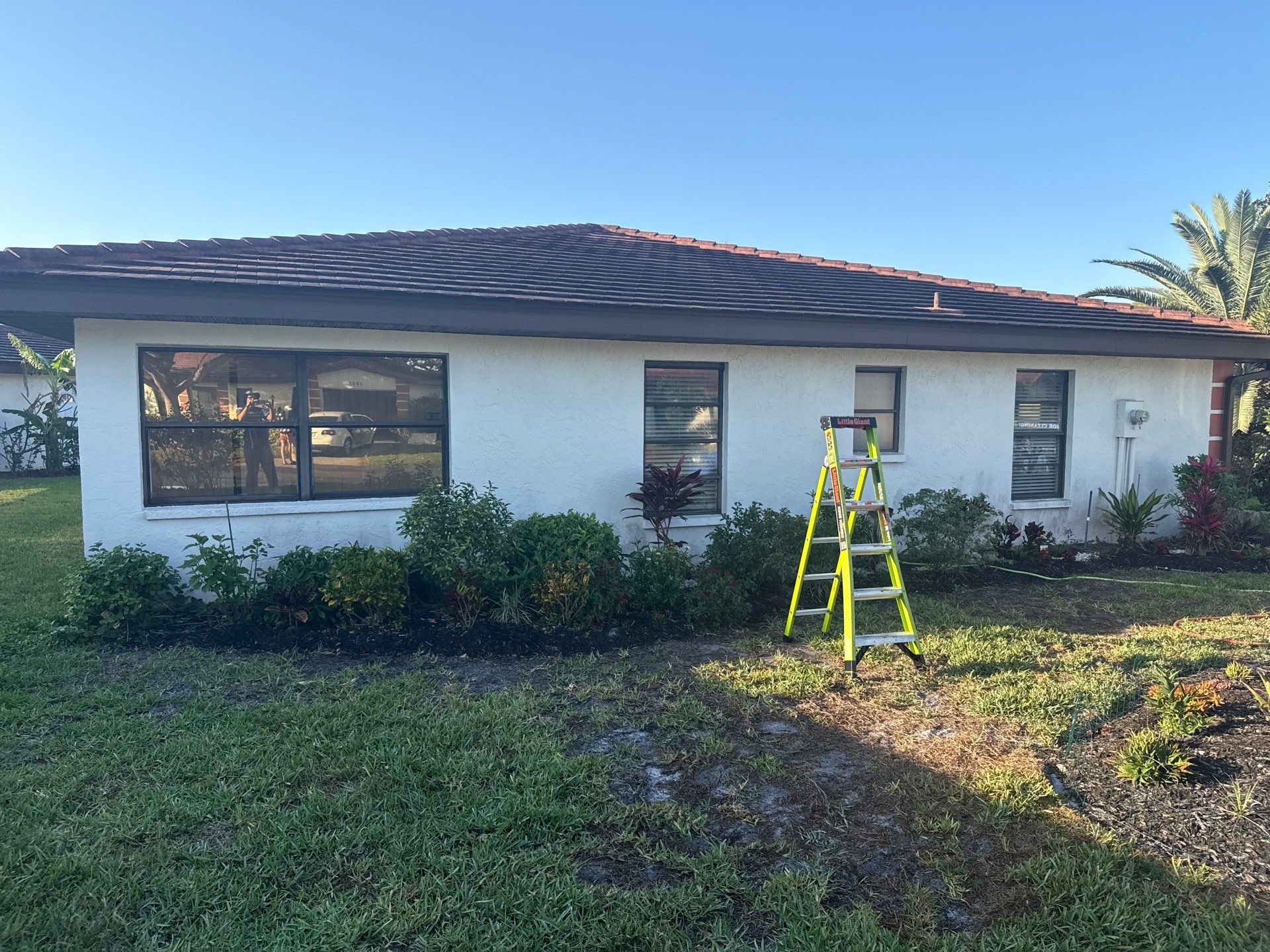 Tile Roof Cleaning – Vivenda at Bradenton I (5-Star Review & Plant Protection) by Sunshine AquaWash