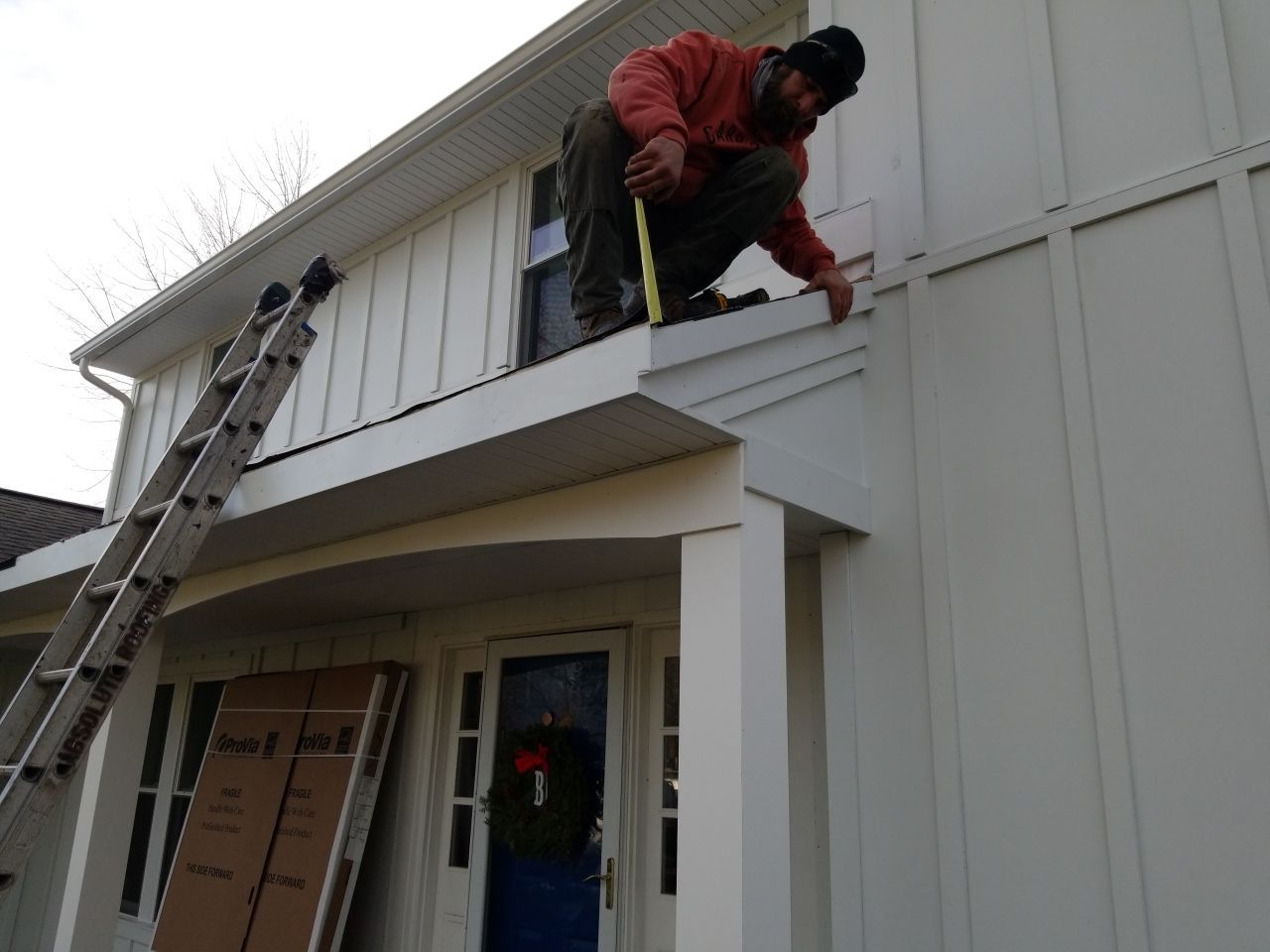 James Hardie Siding  using James Hardie Board and Batten, White by Absolute Roofing and Construction