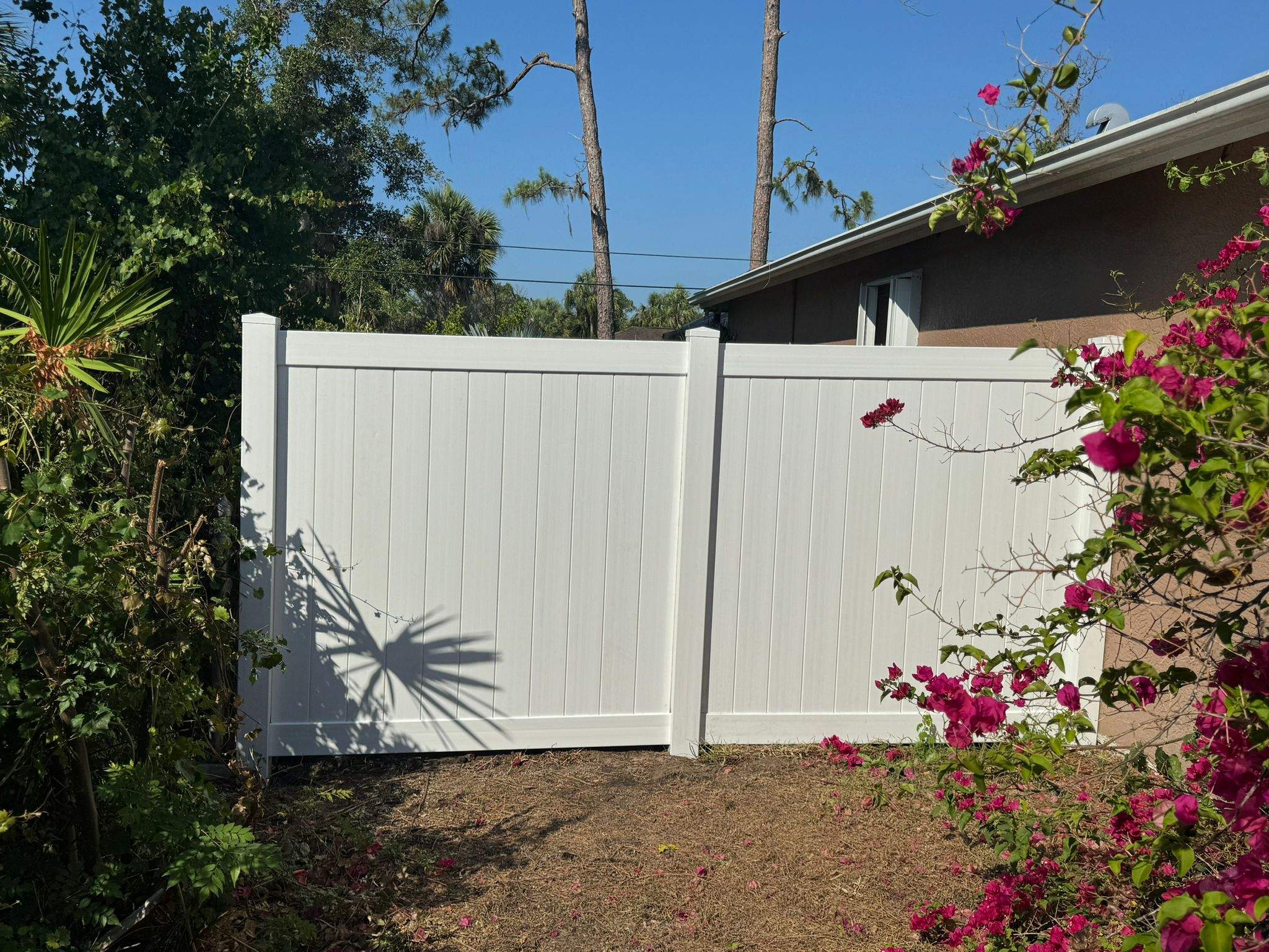 White Vinyl Privacy Fence and Gate Repair in North Port by True Fence LLC