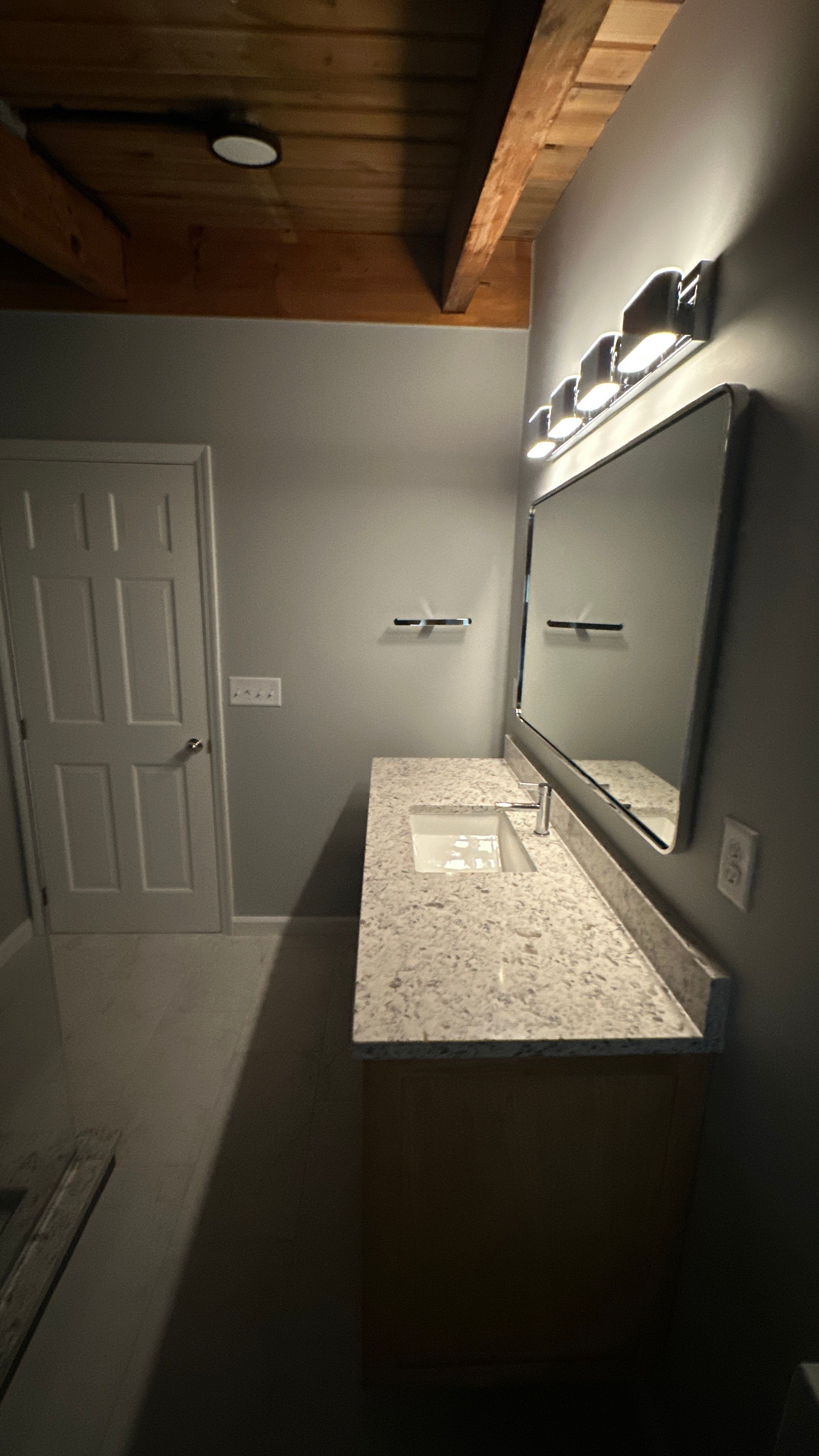 Brandt Double Bathroom Remodel by Integrity Tile and Home LLC