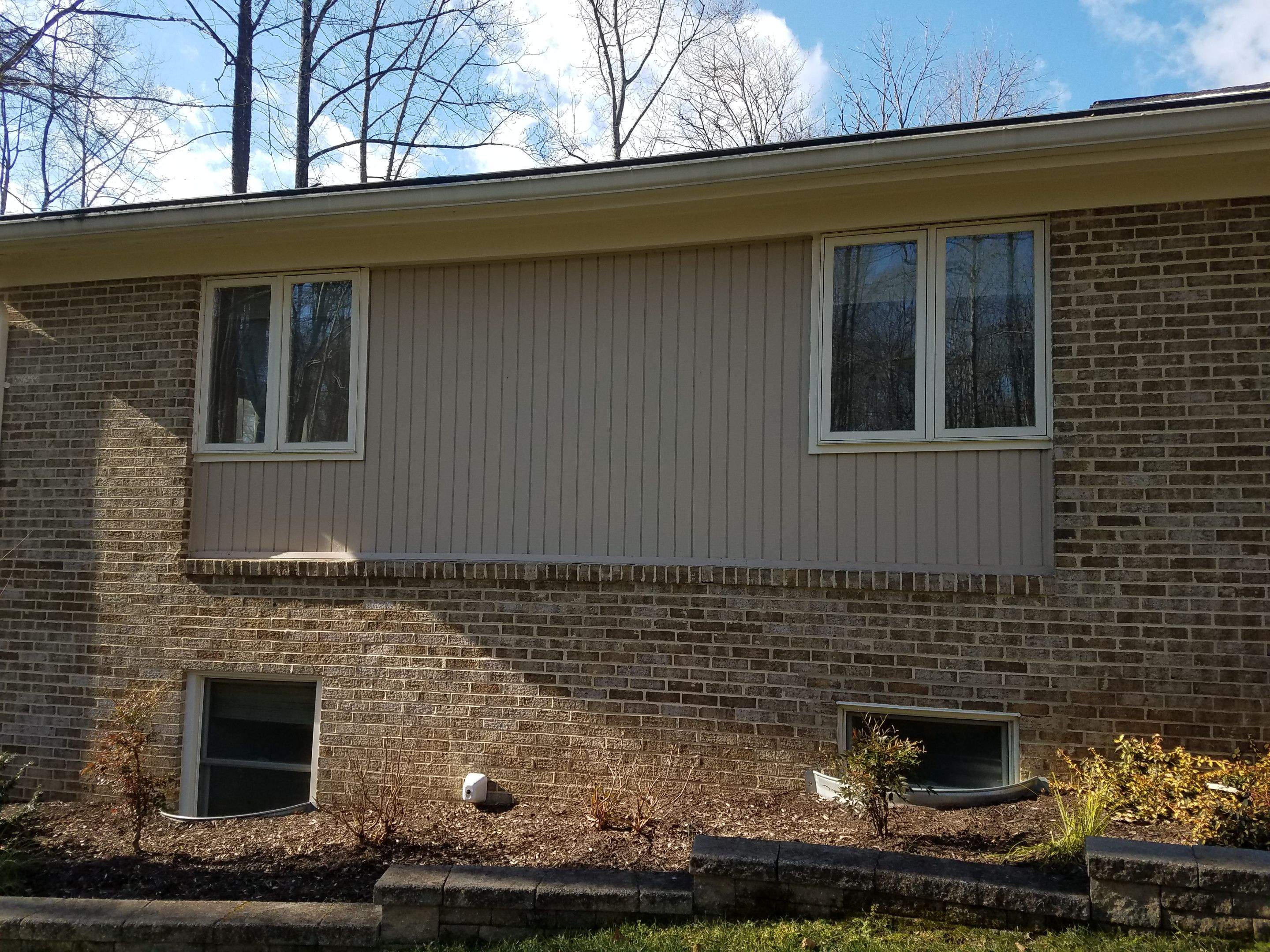 Roof, Siding, Door, and gutter replacement by American Home Contractors