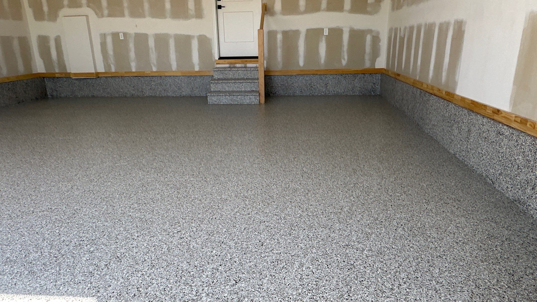 Phil B. new floor with Coyote flake by Banner Garage