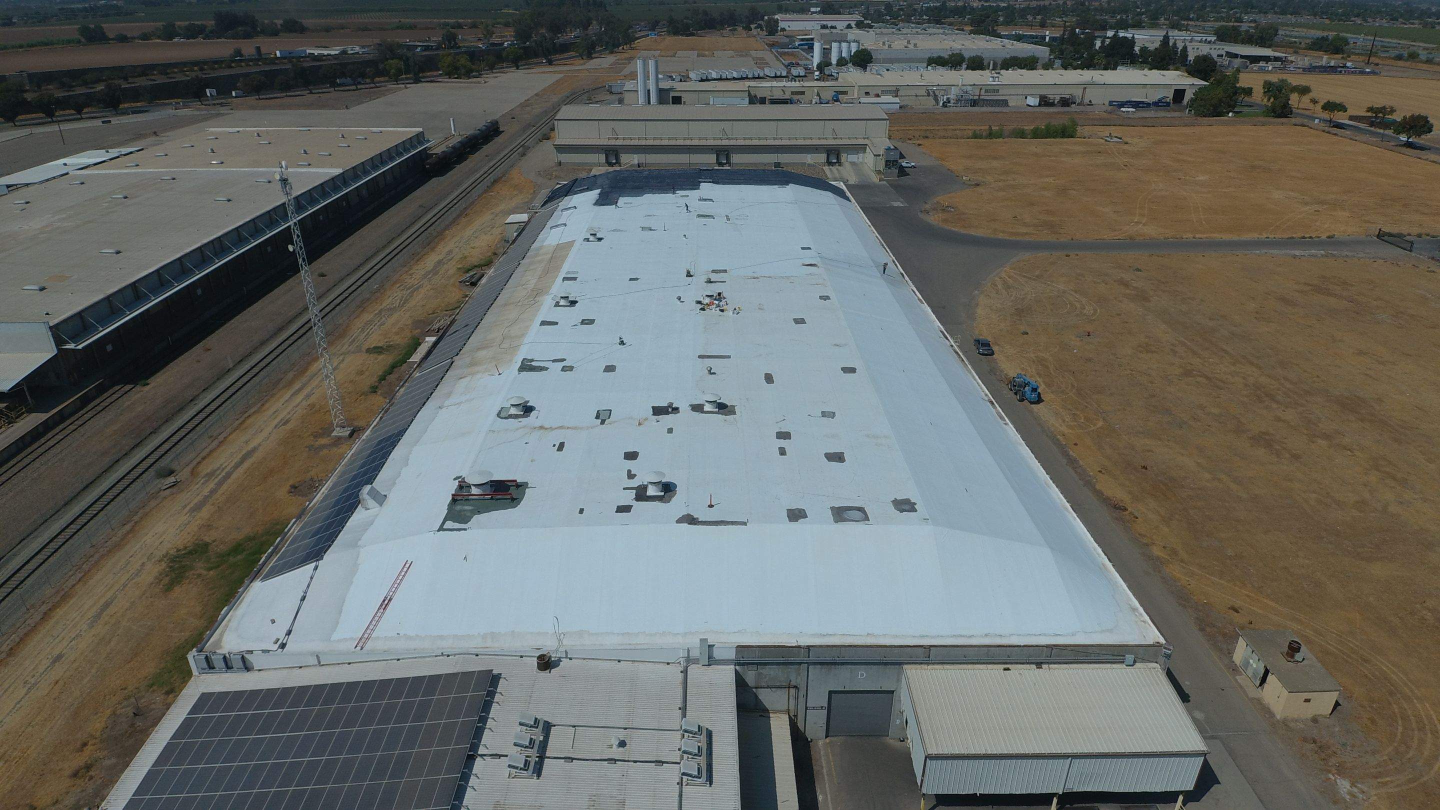 Single-ply restoration system using Conklin Benchmark/PUMA XL fabric and coating by Straight Edge Roofing Inc