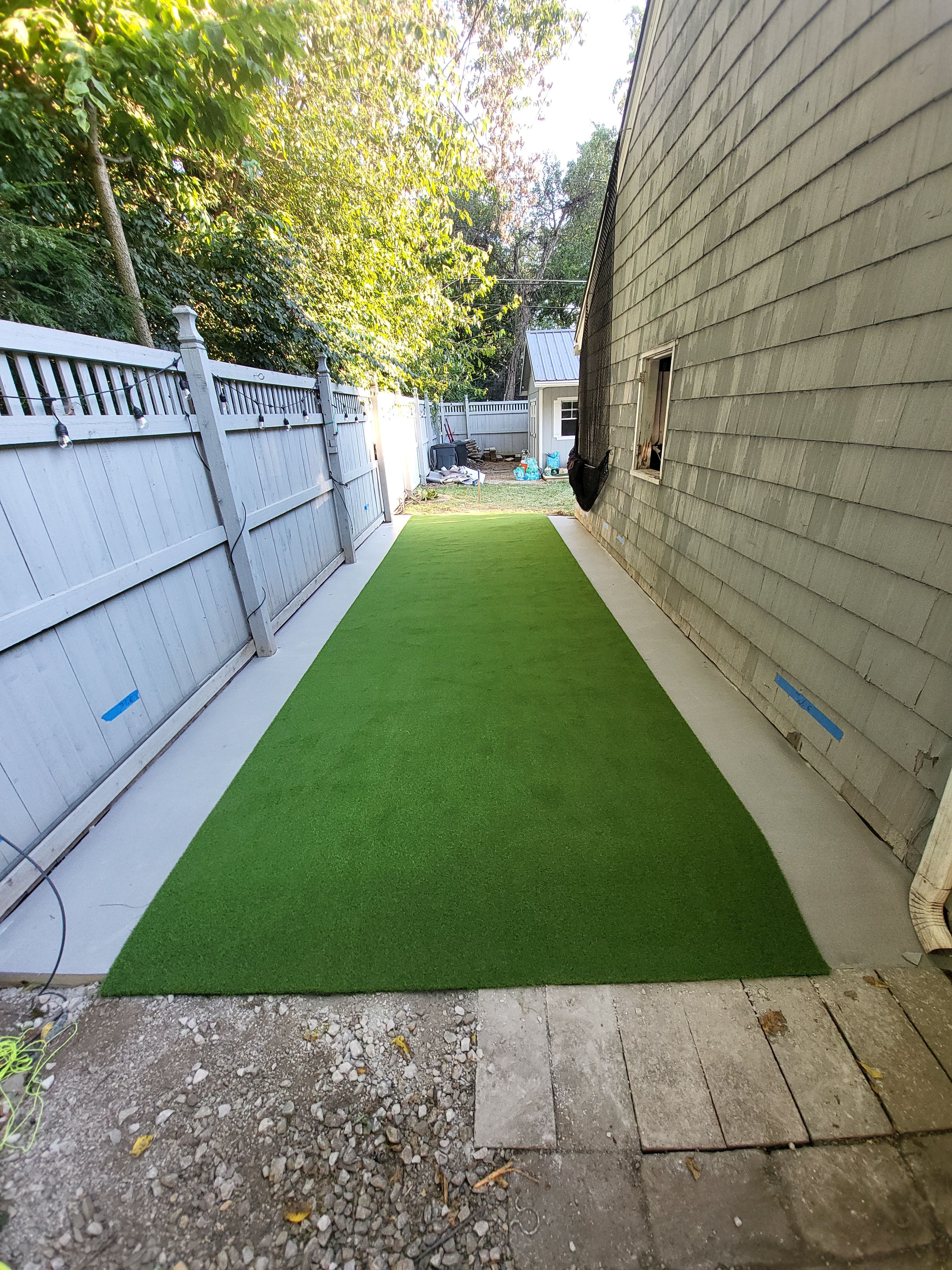 Custom Side Yard Artificial Turf Putting Green Installation in Columbus by Southwest Greens Midwest