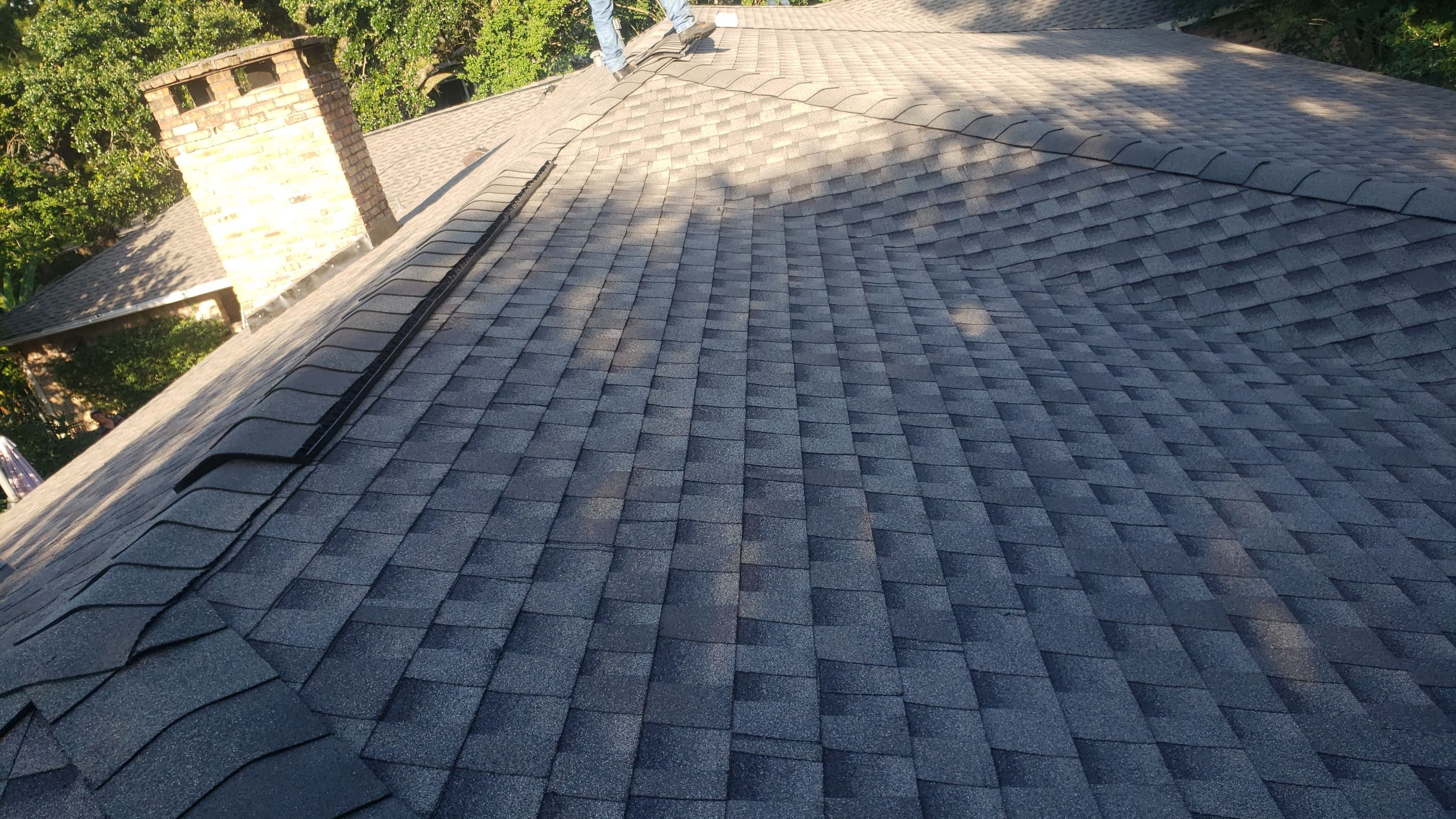 Residential Roofing Installation using Roof Replacement by American Roofing & Construction LLC