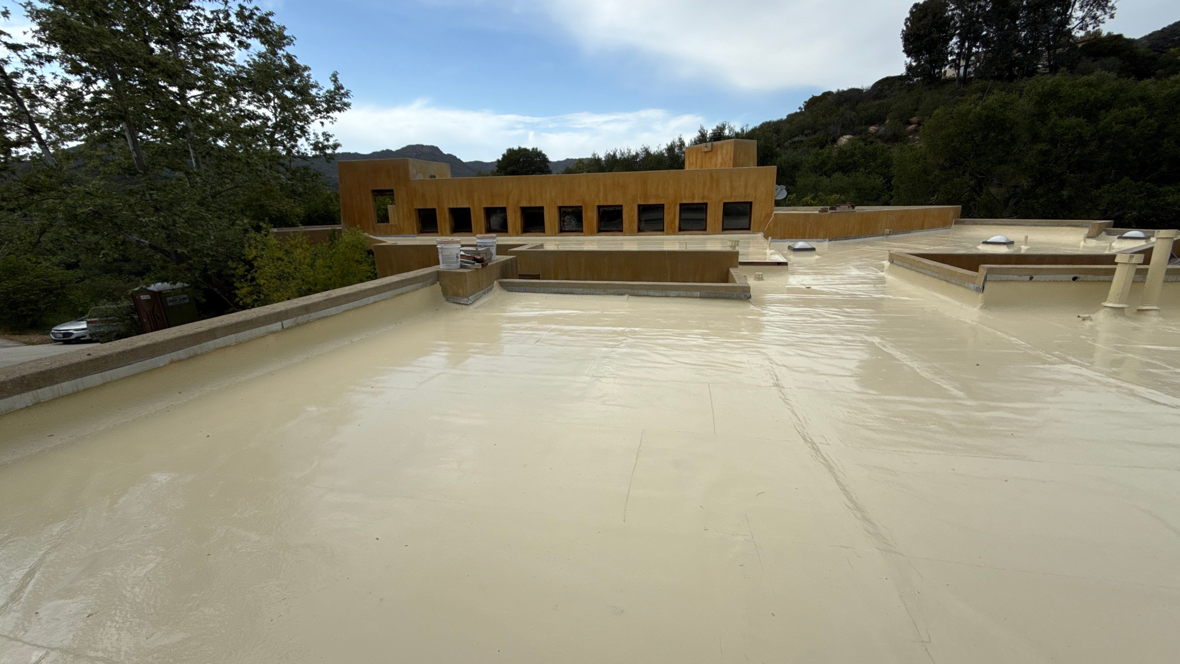 Tan Silicone Applied to a Stunning Residential Property in Calabasas by Hull Brothers Roofing