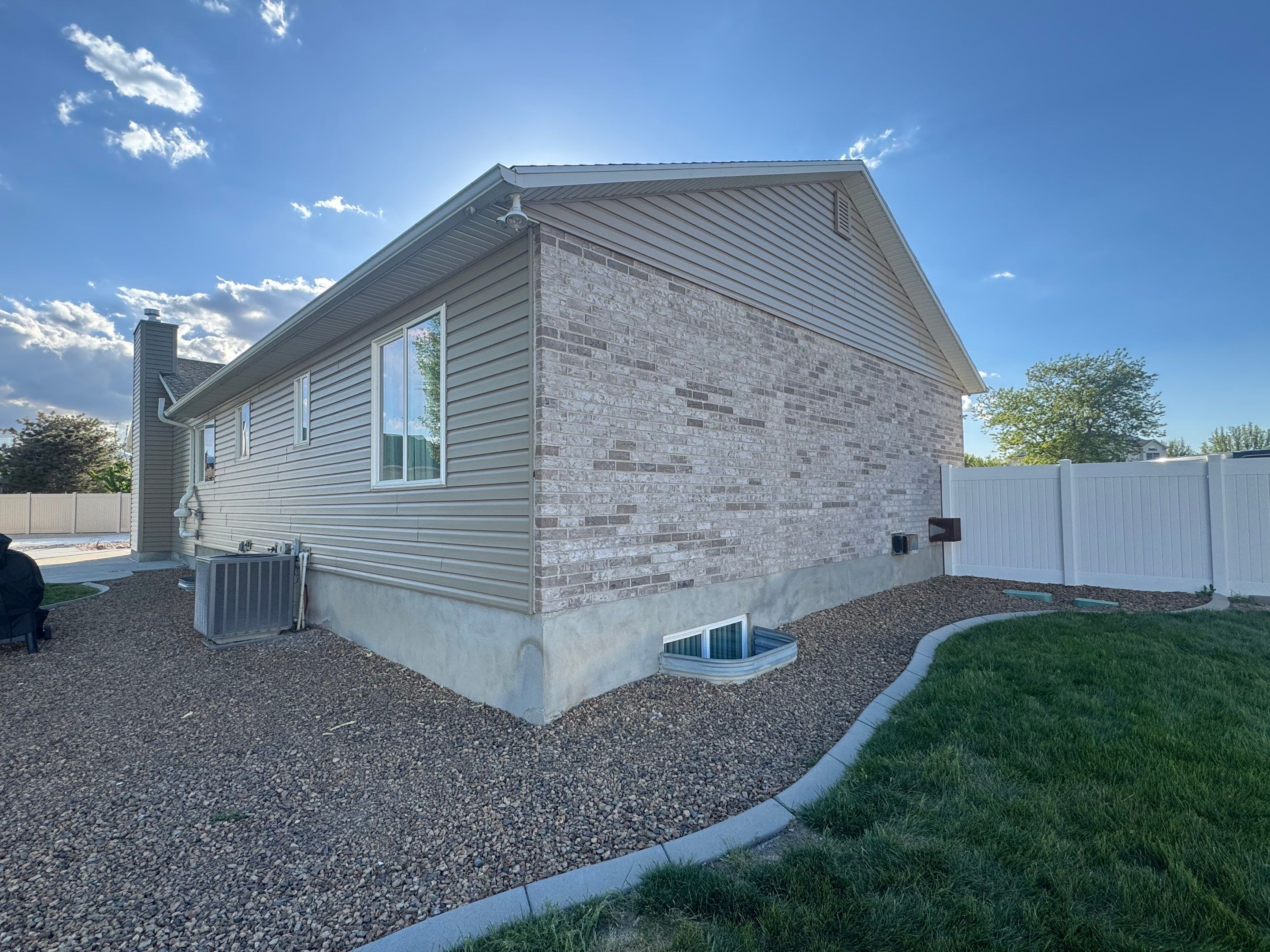 Riverton | Timeless Mastic Vinyl Overhaul | Pebblestone Clay by Ideal Siding Utah