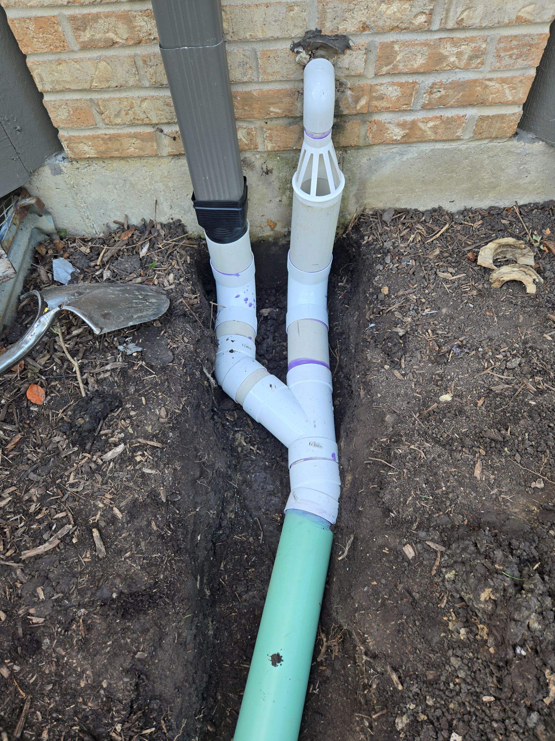AquaShield Sump Pump Discharge System and AquaShield Downspout Discharge System by Allied Water Services