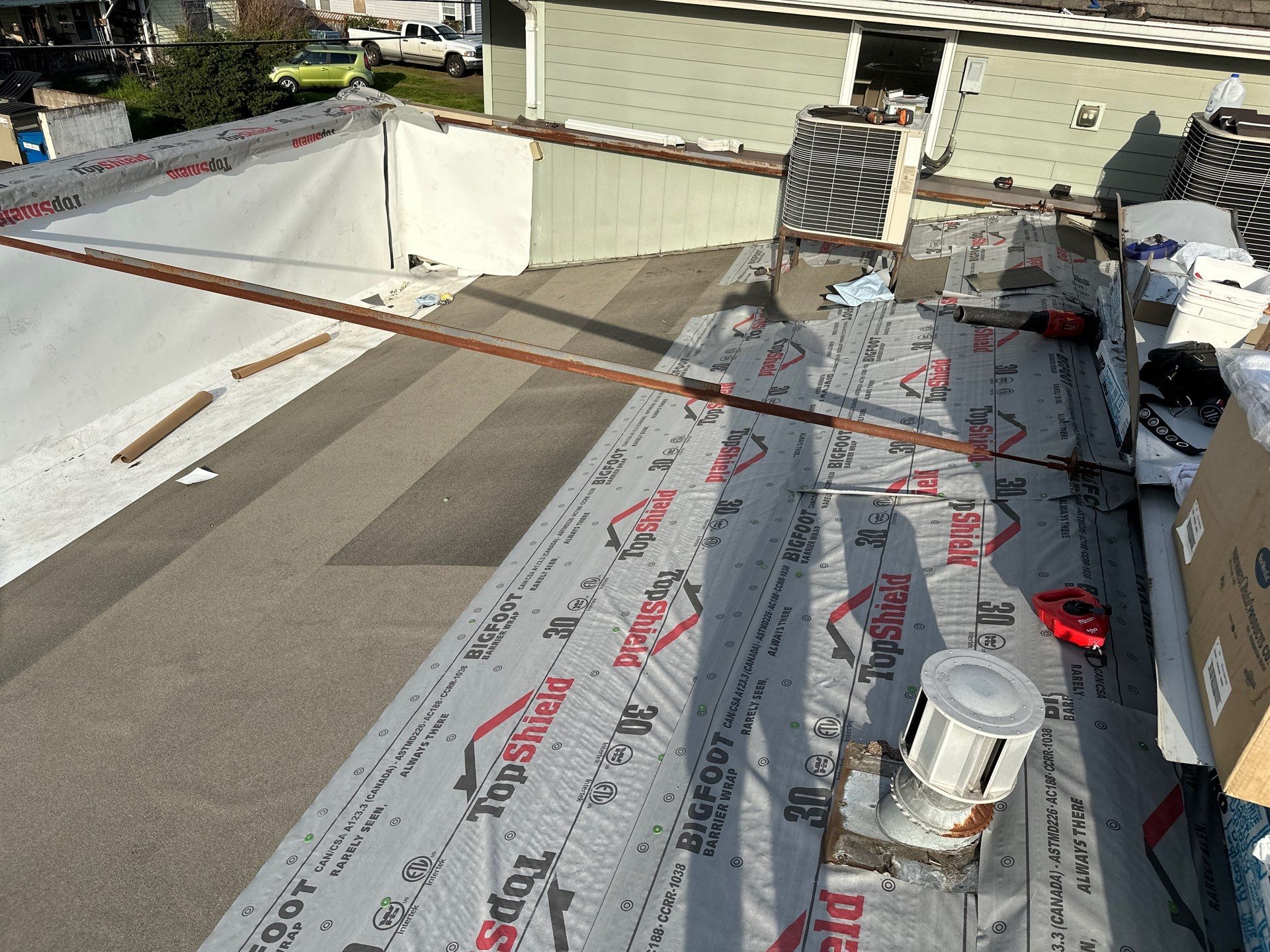 Commercial Roofing Installation using IKO Dynasty & GAF 60Mil TPO by Orezona Building & Roofing Company, Inc.