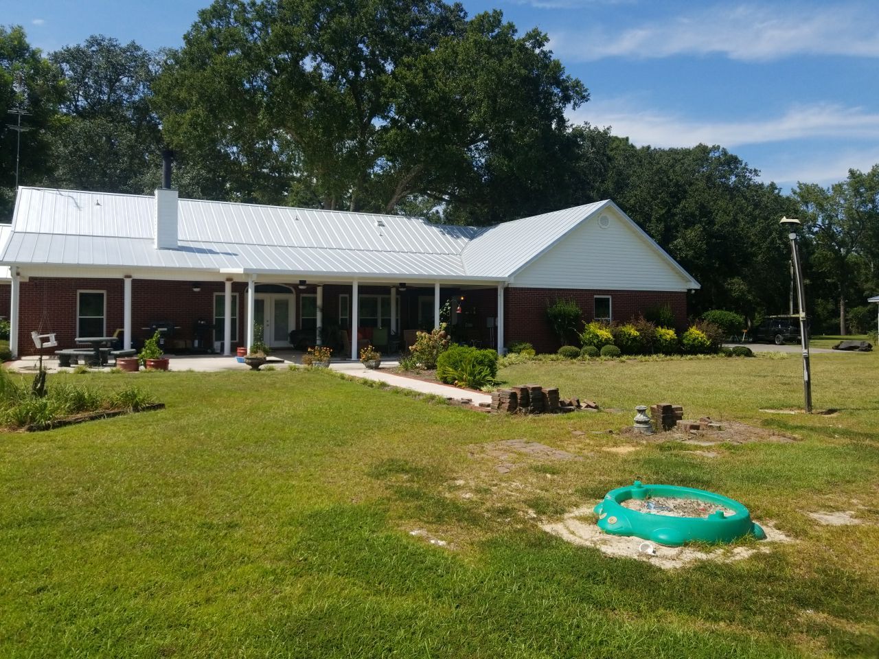 Residential Roofing Installation using Metal roofing by American Roofing & Construction LLC