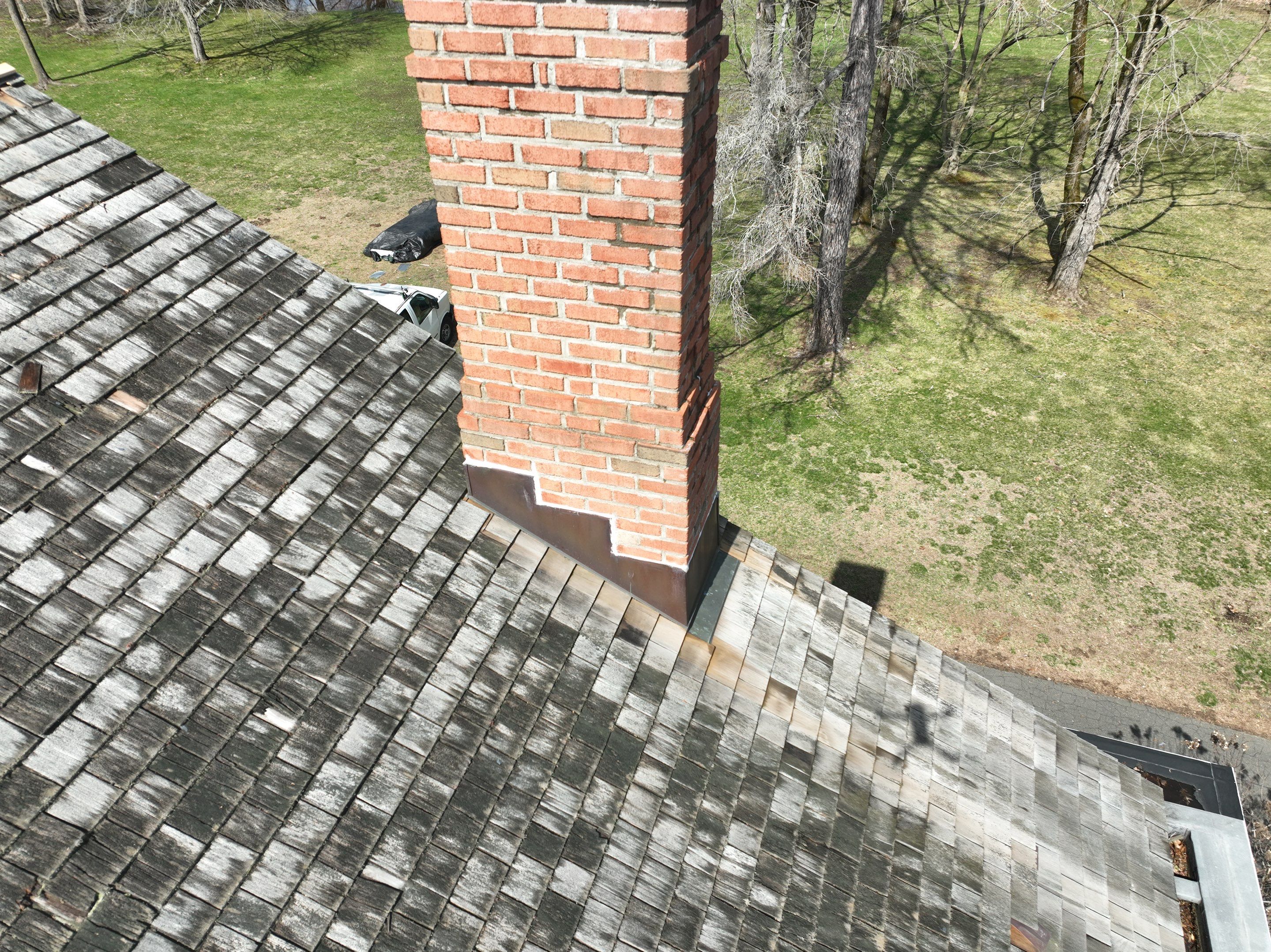Residential Roofing Installation using Vermont Slate by A Plus Exterior