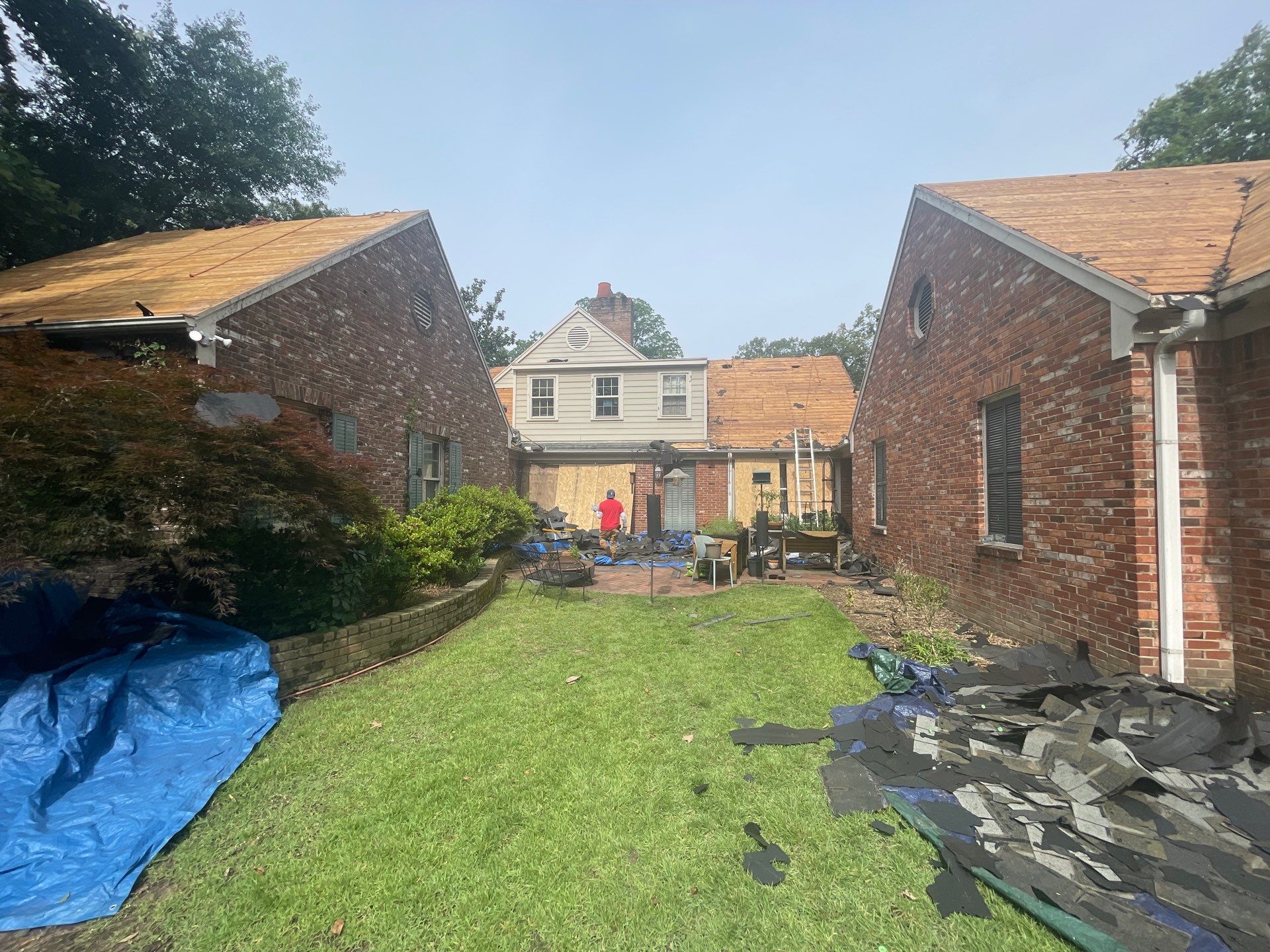 Full Roof Replacement with gutter upgrade after tree impact damage in East Memphis by Revival Roofing Services