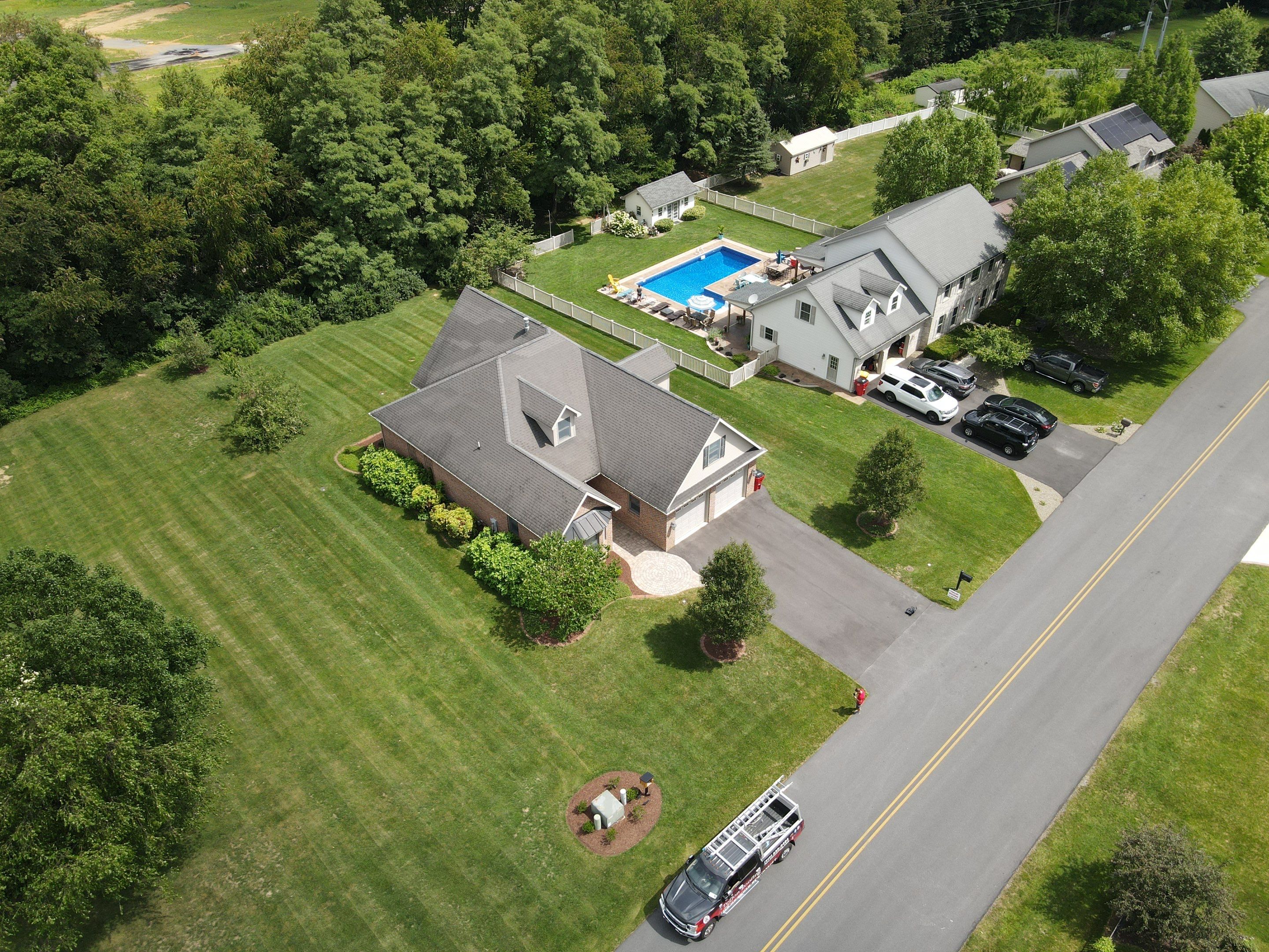 Standing seam / Azm panel in black  by Teflon Roofing