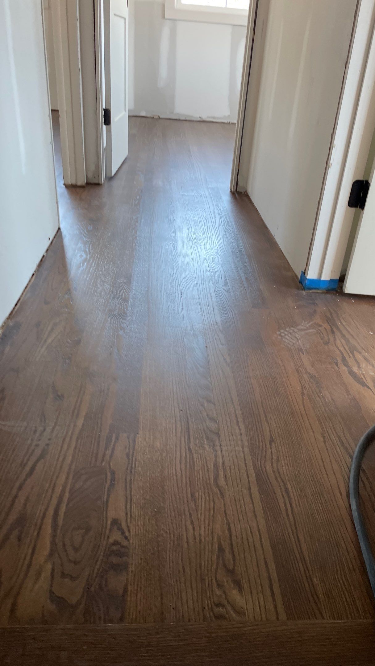 Remodeled Home with new tile floors, Showers and Refinished Oak Floors with stain and Waterbased Finish by Footprints Floors of Coastal Carolina