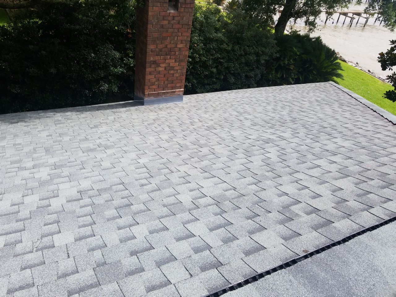 Residential Roofing Installation using Roof Replacement by American Roofing & Construction LLC