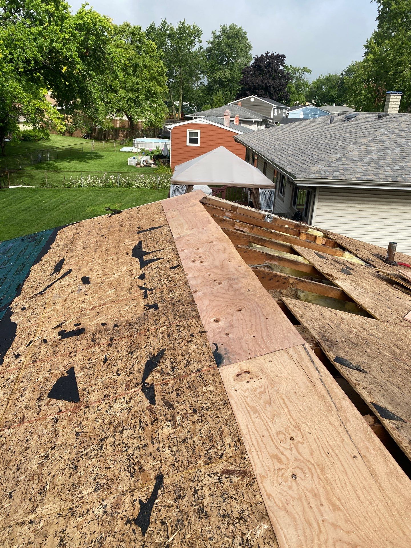 Asphalt Roof Replacement by Custom Installations