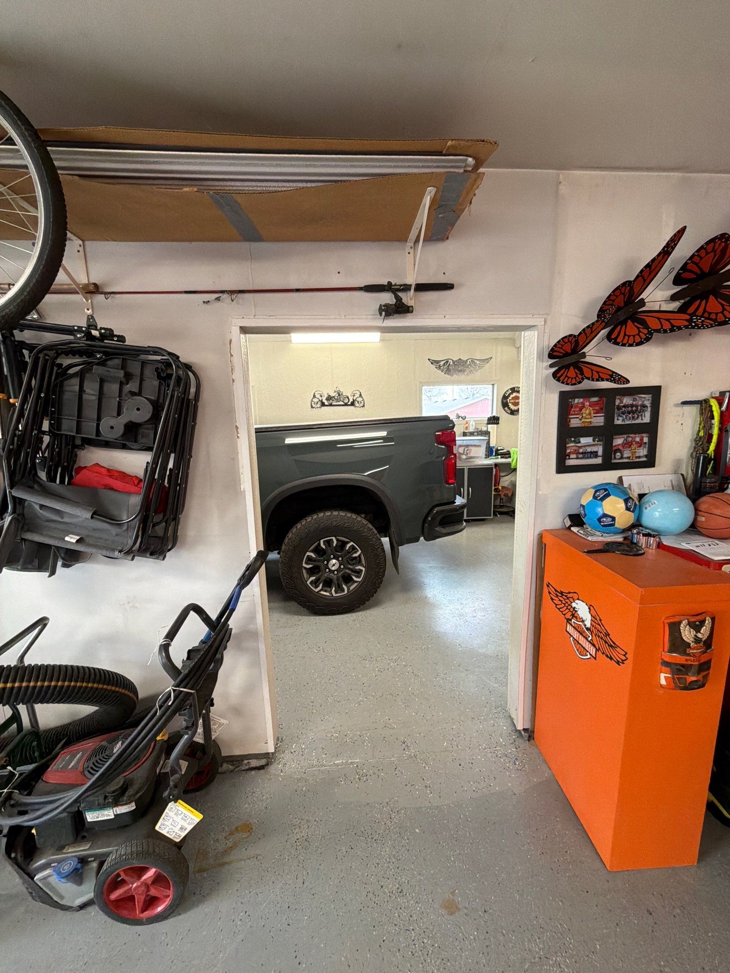 Custom Grey Flake Epoxy Garage Floor Installation in Remsen by Select Painting, Coatings & Garage Cabinets