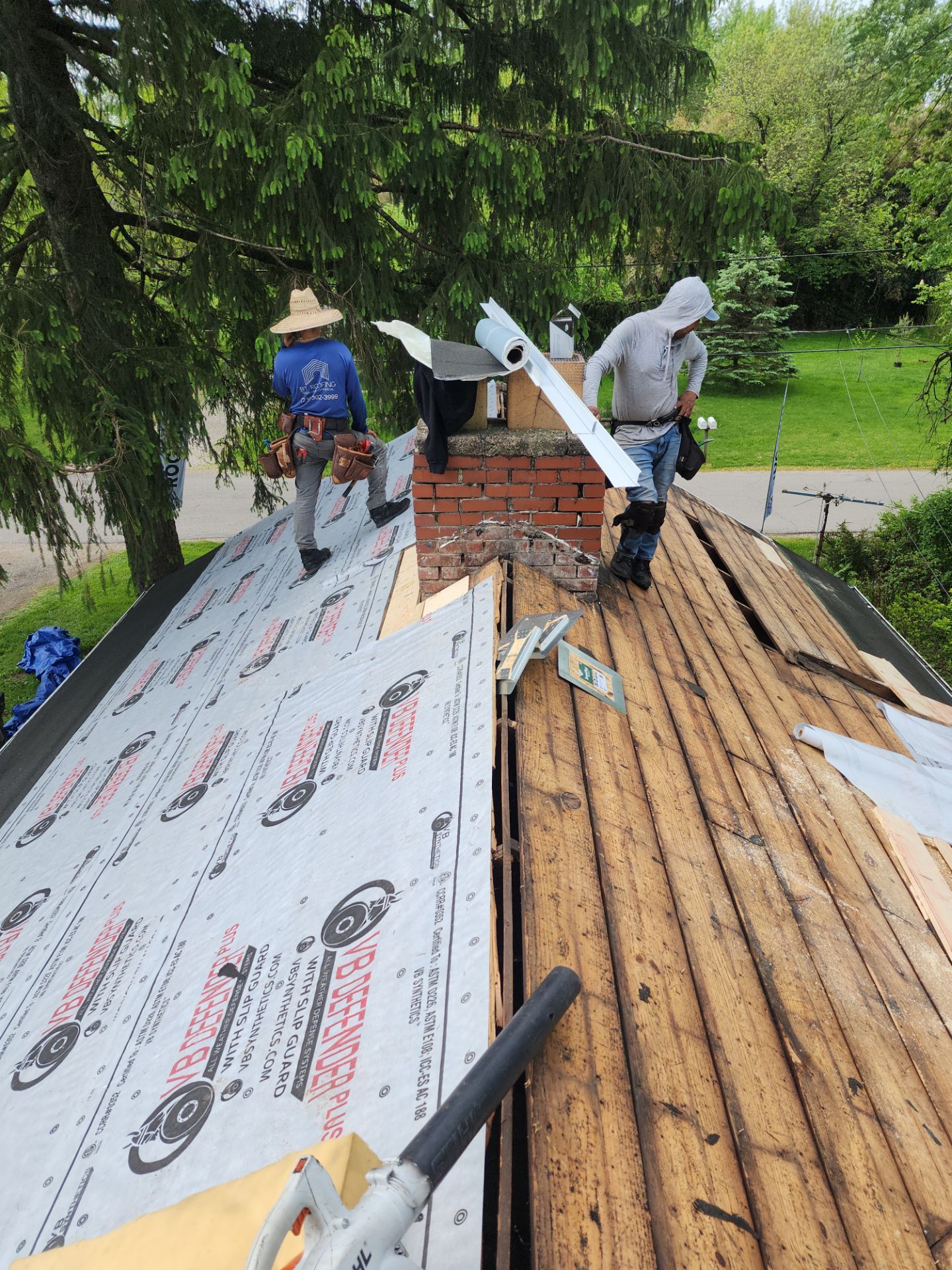 Re-roof the Art Studio nestled among the pines by SOS Home Ohio 