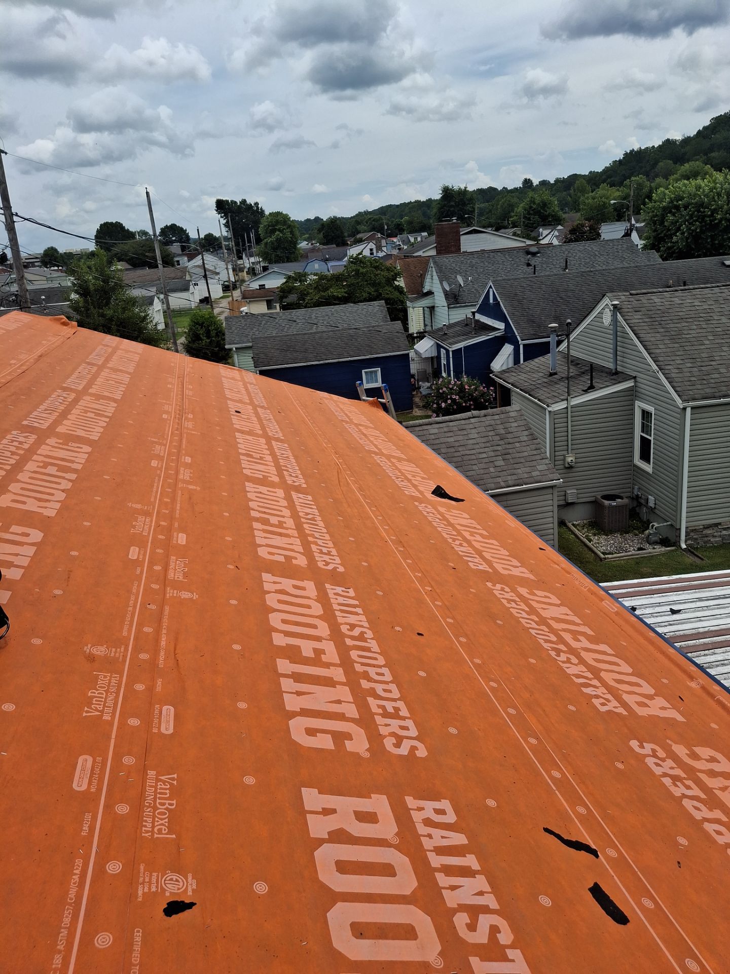 Residential Roofing Installation using Metal by Rainstoppers Roofing