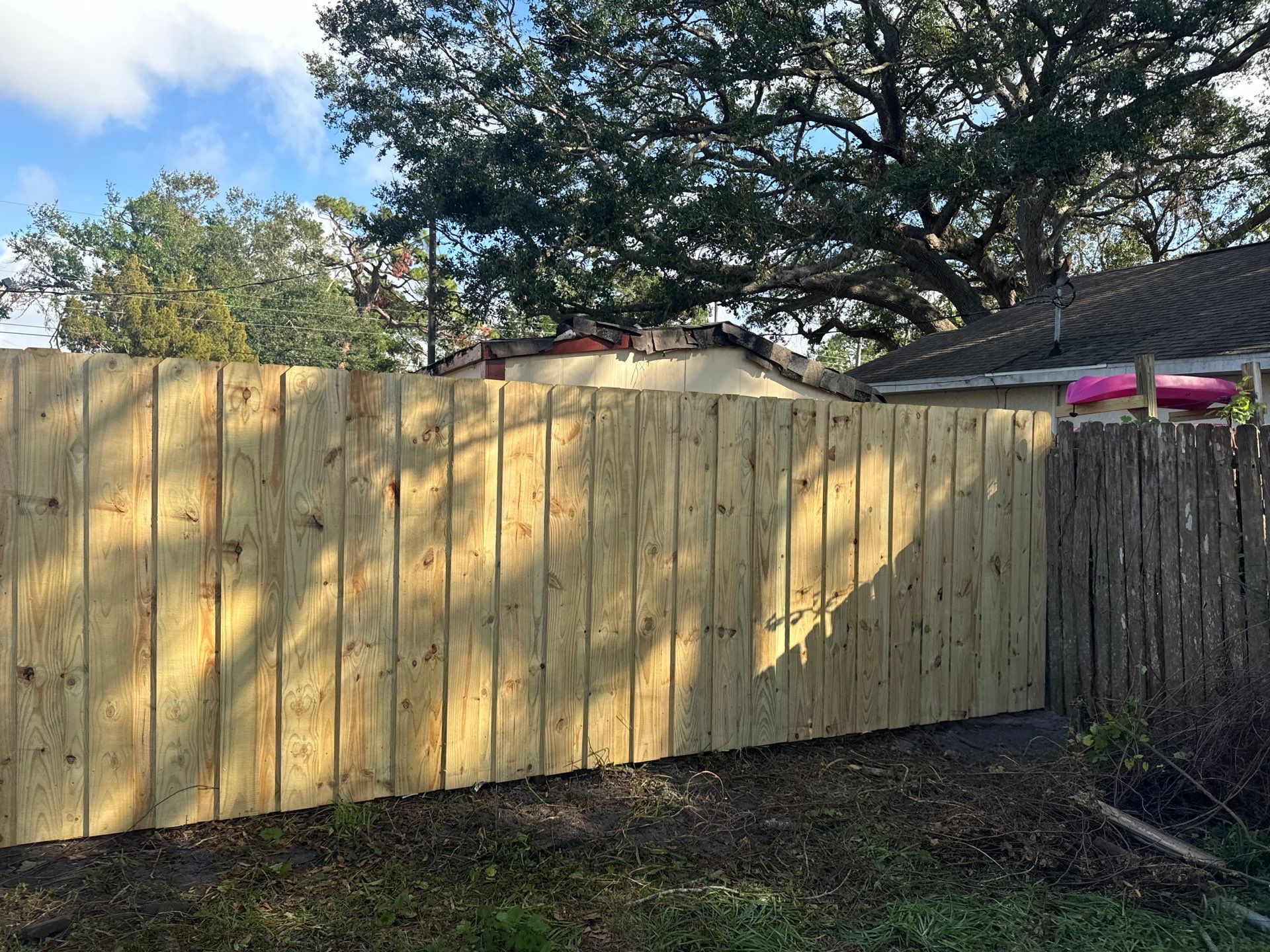 Wood Fence Installation using 6Ft Pressure Treated Wood Board On Board Privacy Fence by Asap fence and gates, LLC