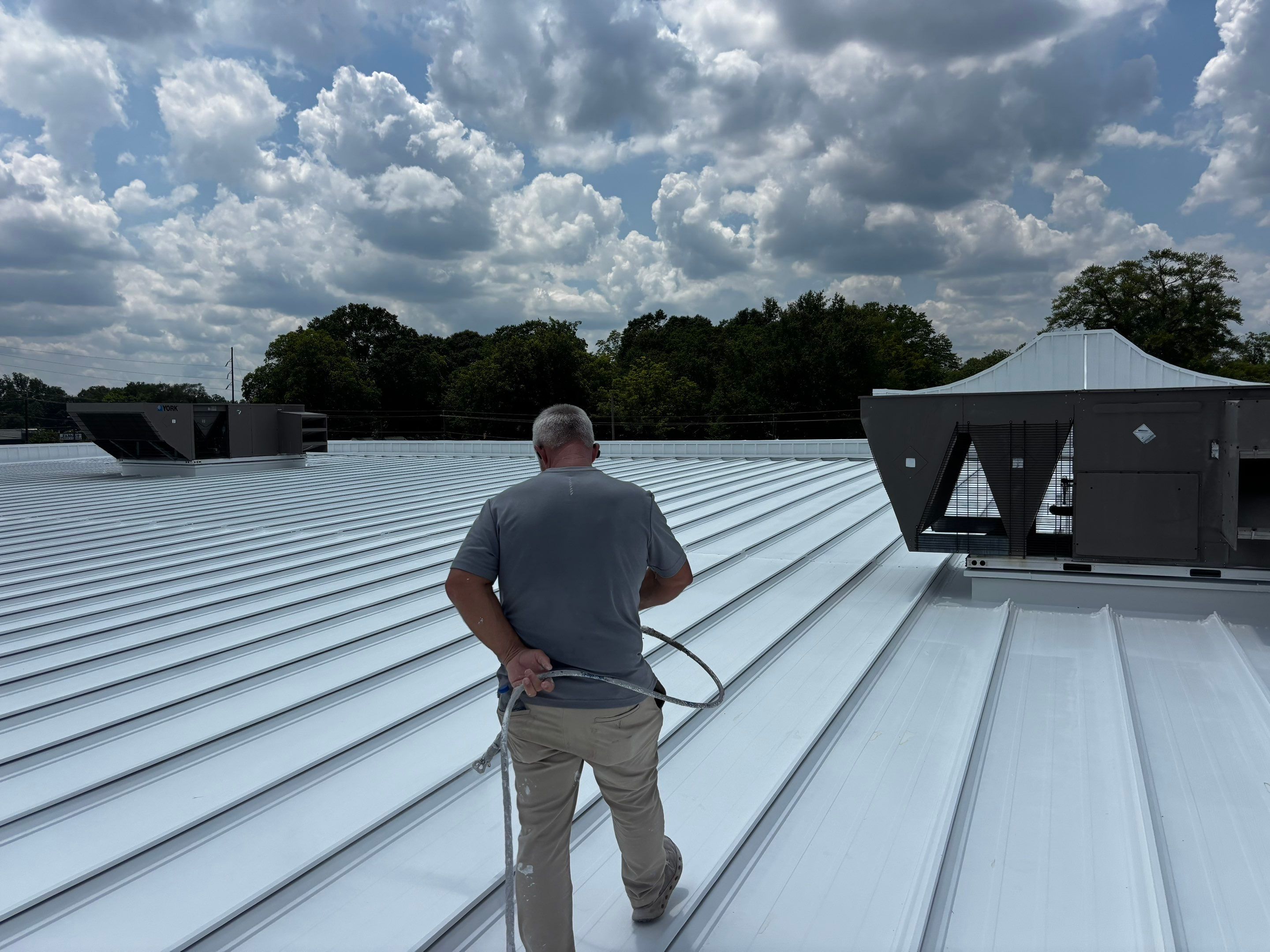 12,180 SQ Ft Commercial Metal Roof Restoration in Clarkston by Southern Roof Solutions