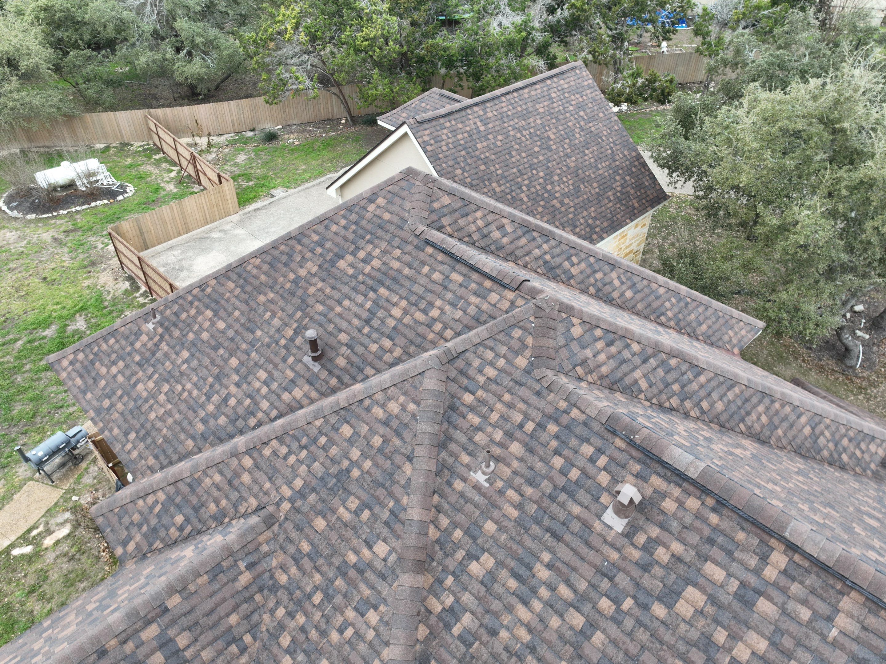 Residential Roof Replacement using 30 Year Laminate Shingles with High Profile Ridge by Premier Roofing and Contracting