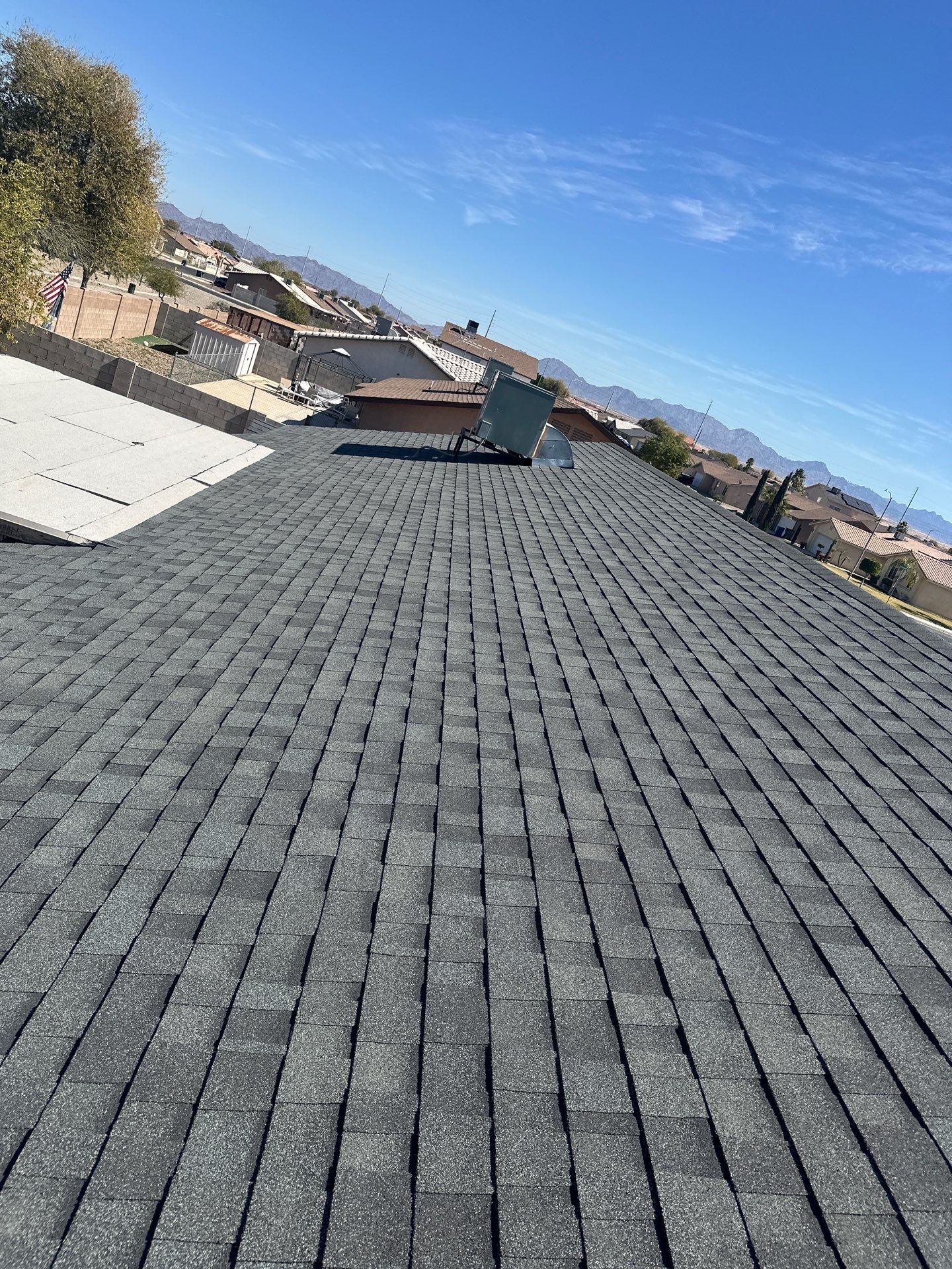 Estate Gray Shingles by Reimagine Roofing