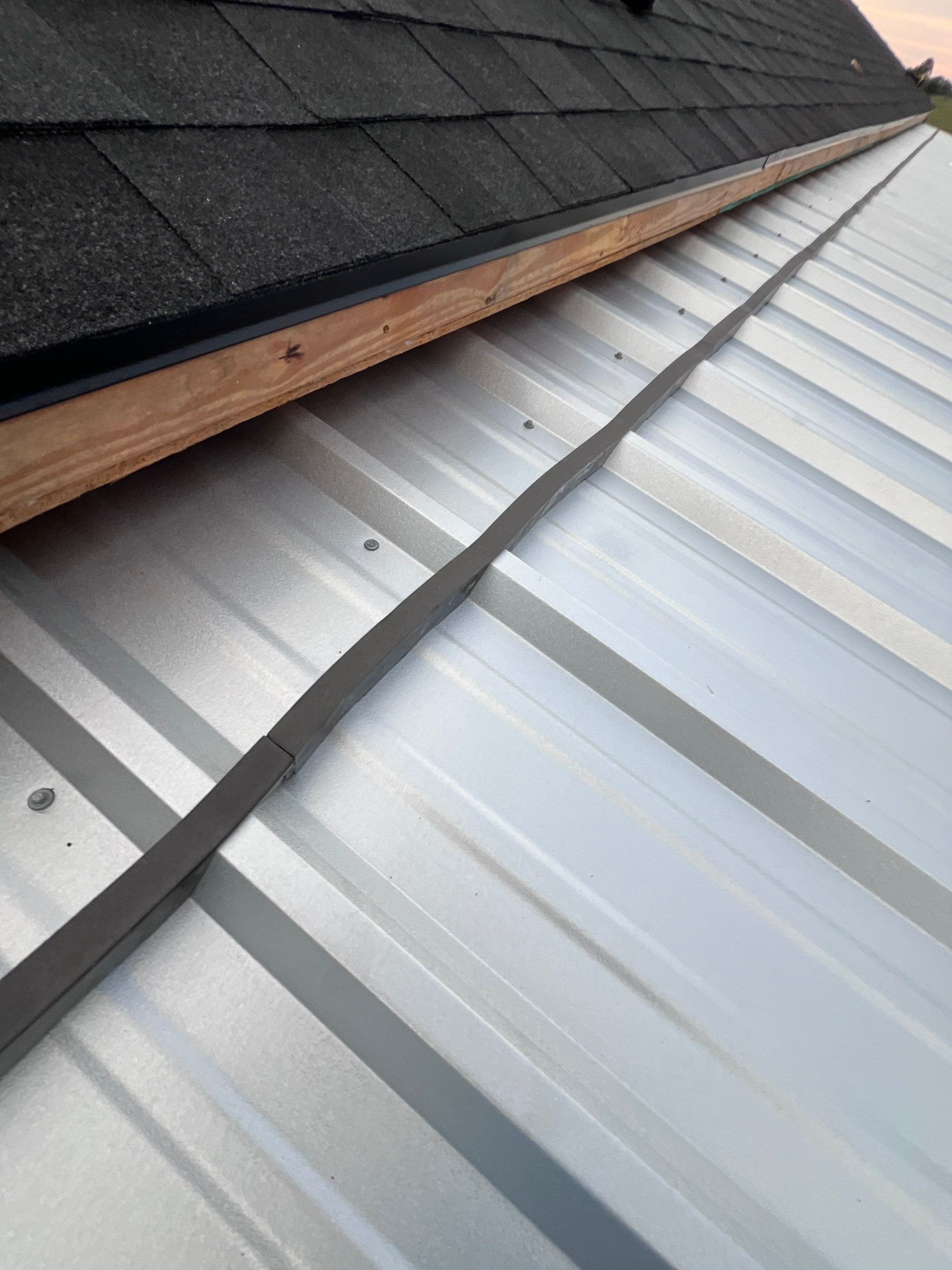 Residential Roofing Installation using Metal by Roof Repair Company