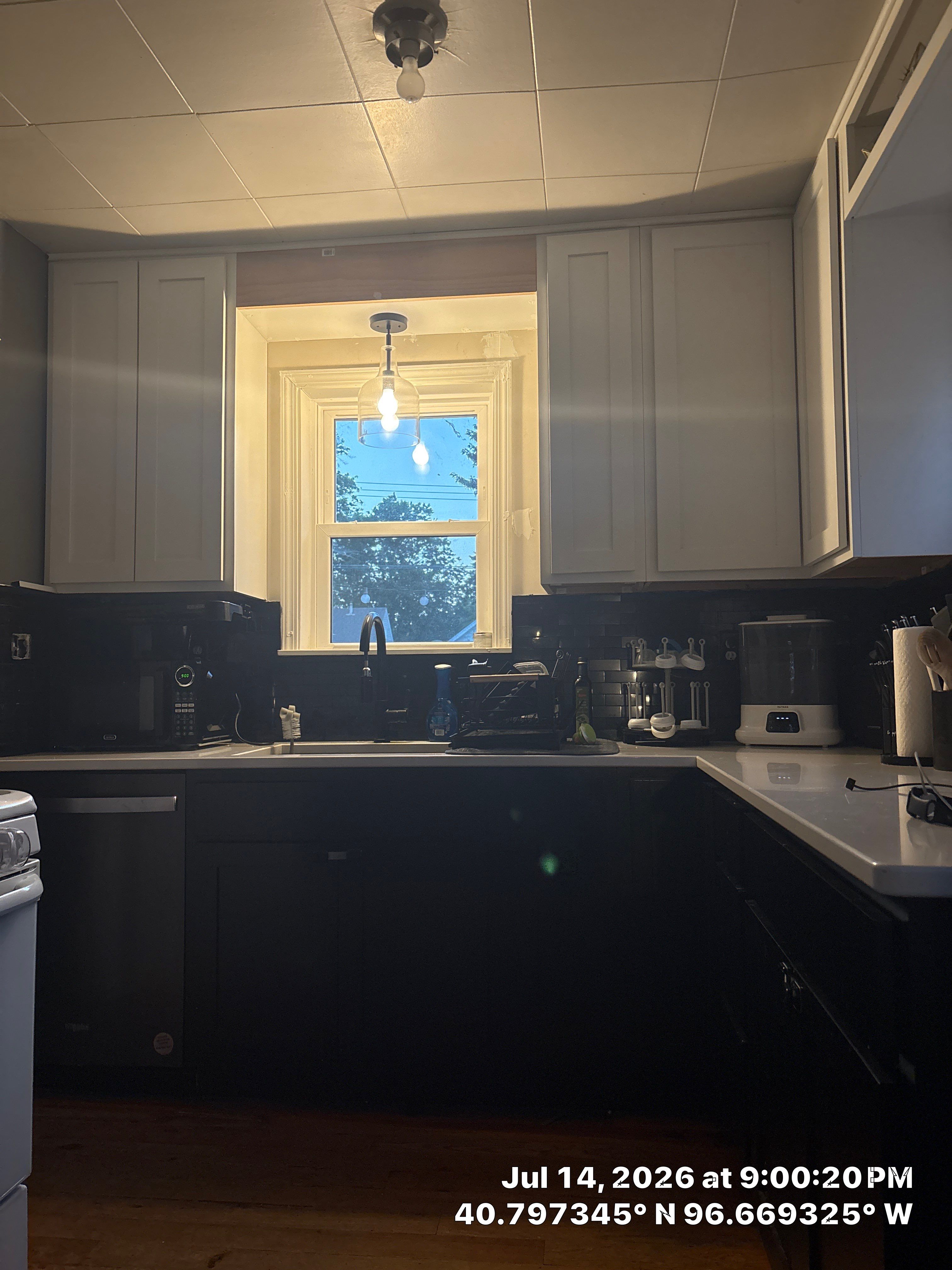 Two-Tone Kitchen Remodel with Quartz Countertops in Lincoln by CompanyCam Sales Demo