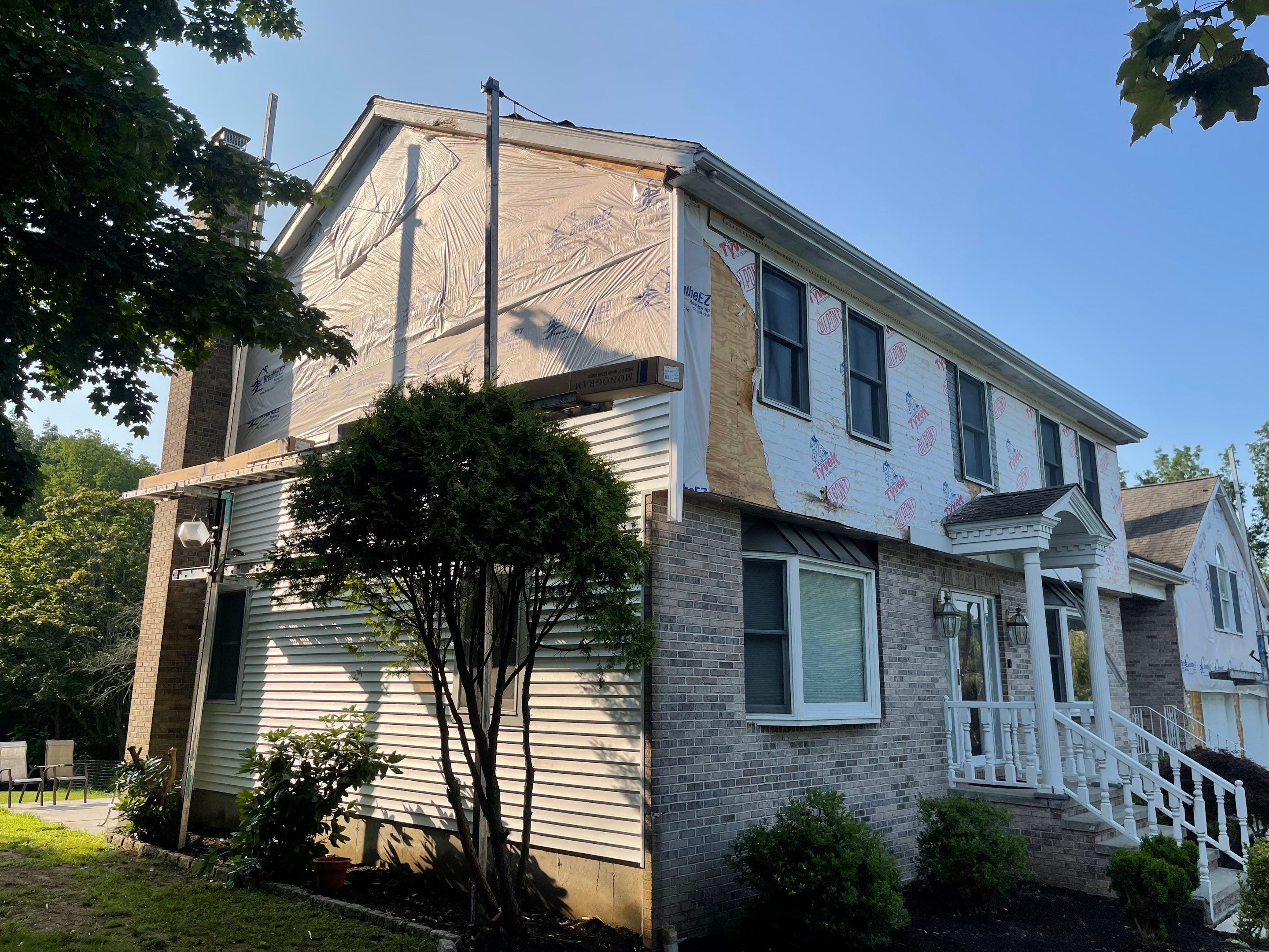 Siding Installation using Mainstreet Colonial & White gutters by A Plus Exterior